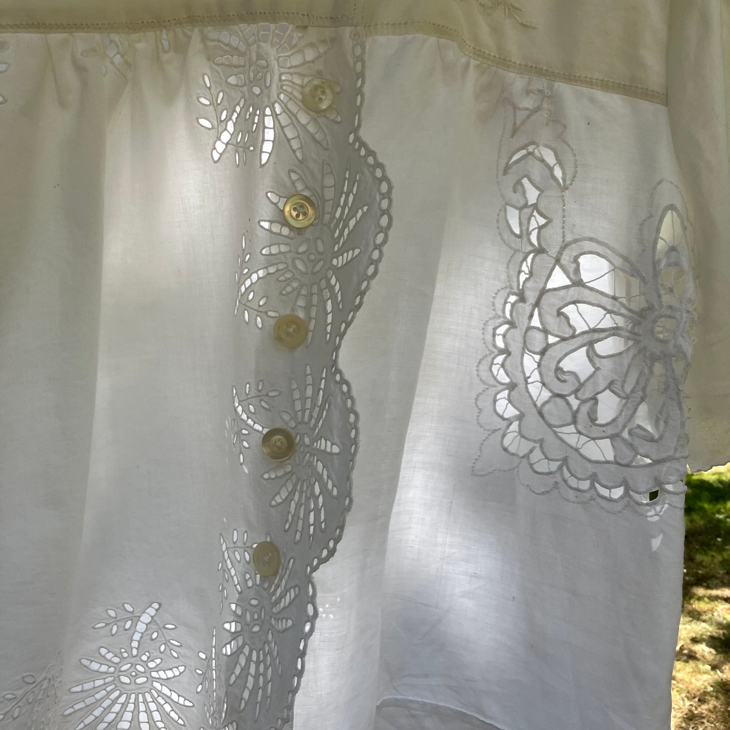 shirt made from a patchwork of recycled vintage white table linen