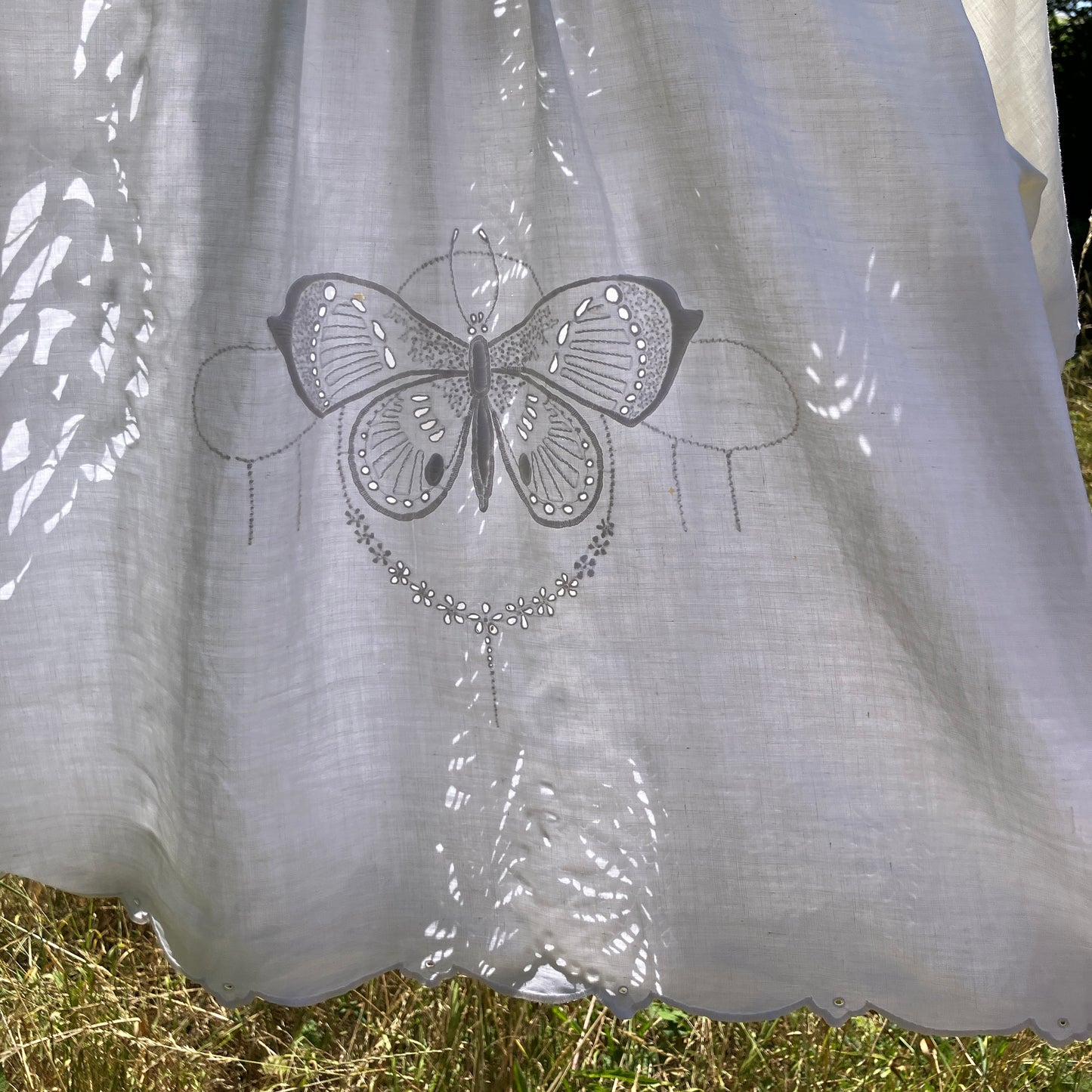 shirt made from a patchwork of recycled vintage white table linen