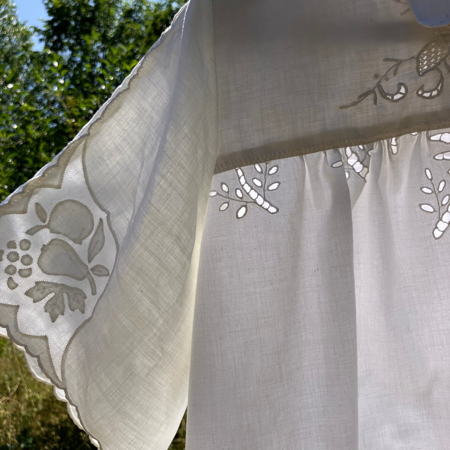 shirt made from a patchwork of recycled vintage white table linen