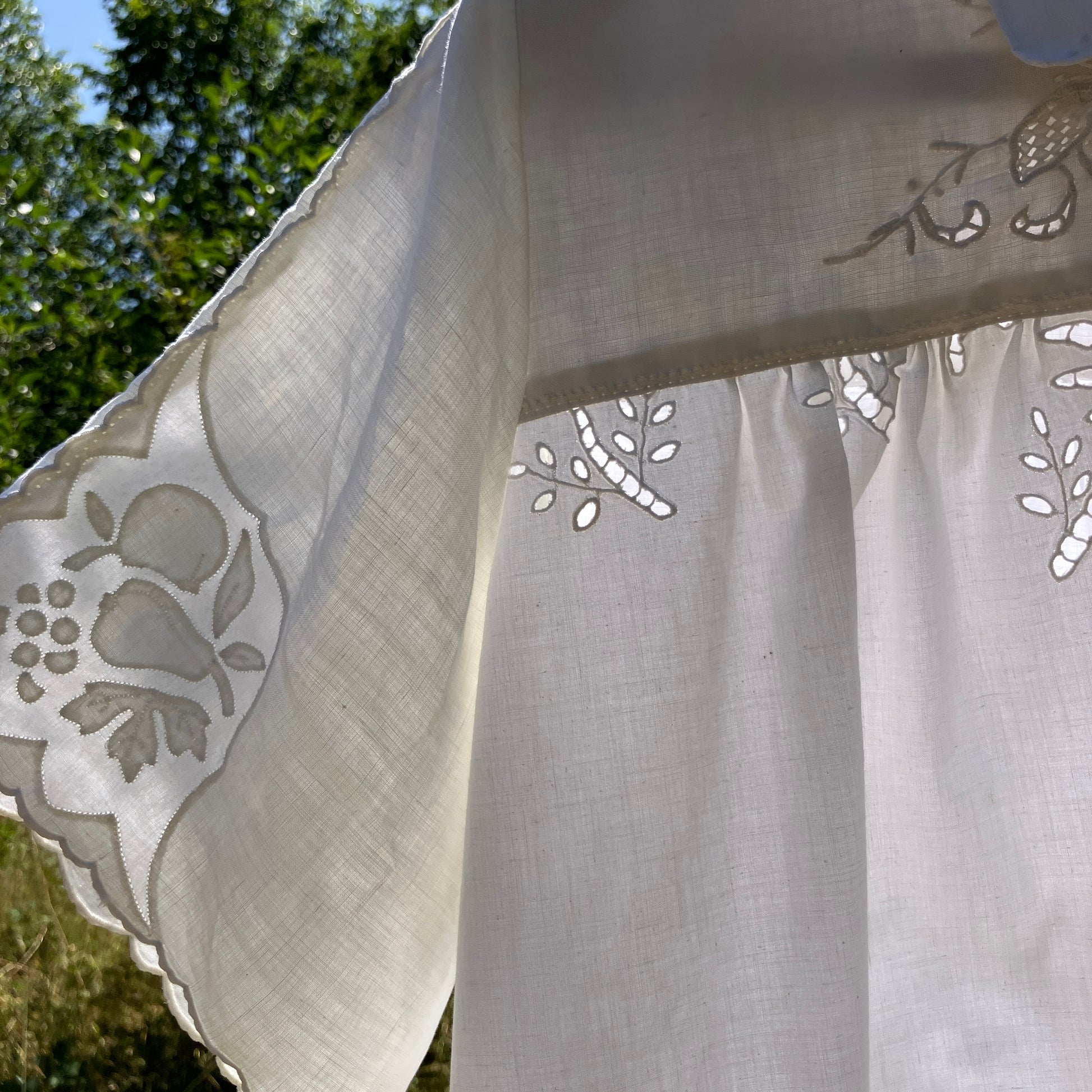 shirt made from a patchwork of recycled vintage white table linen