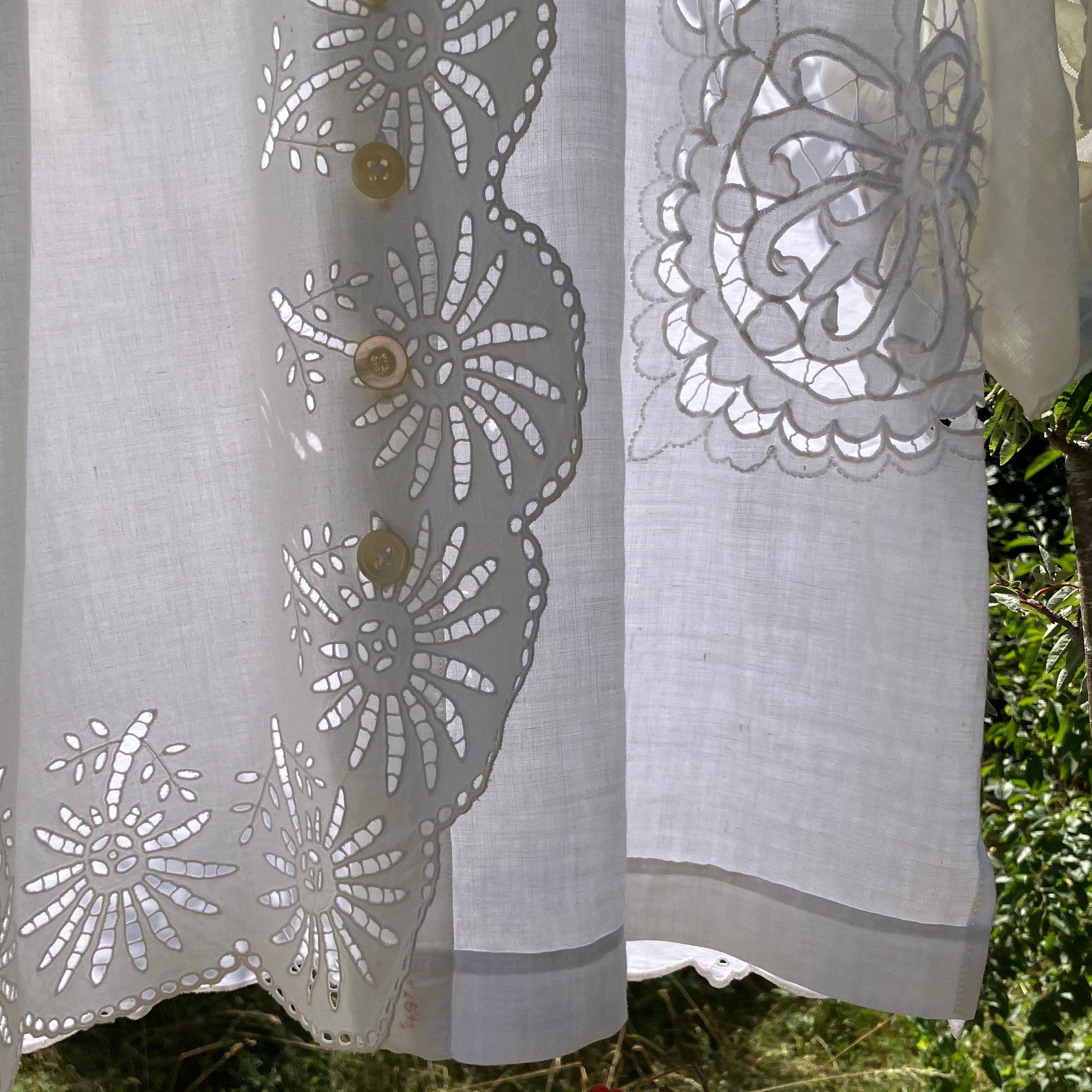 shirt made from a patchwork of recycled vintage white table linen