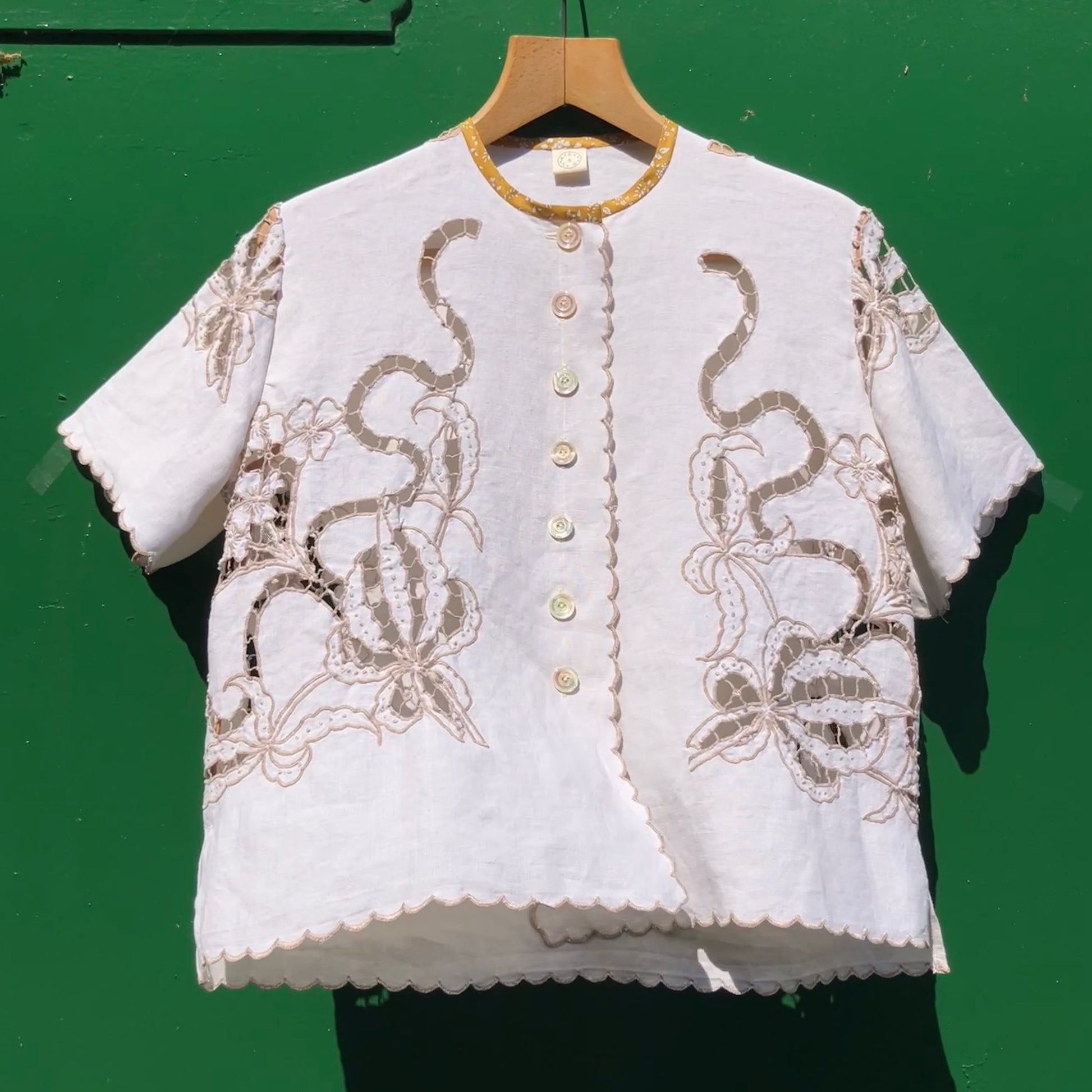 Top made from a vintage cutwork linen tablecloth
