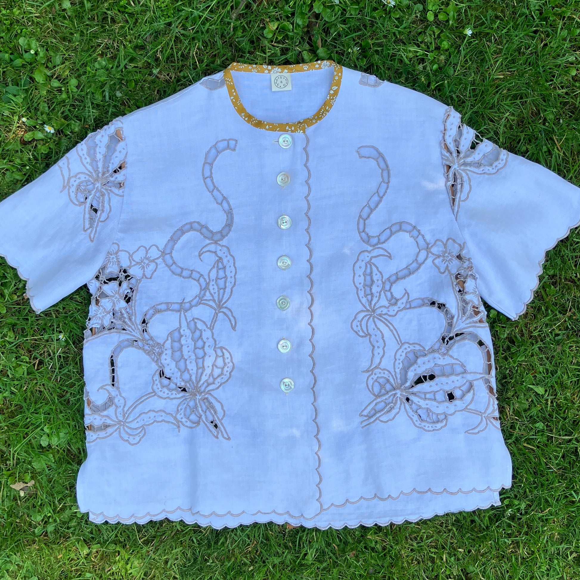 Top made from a vintage cutwork linen tablecloth