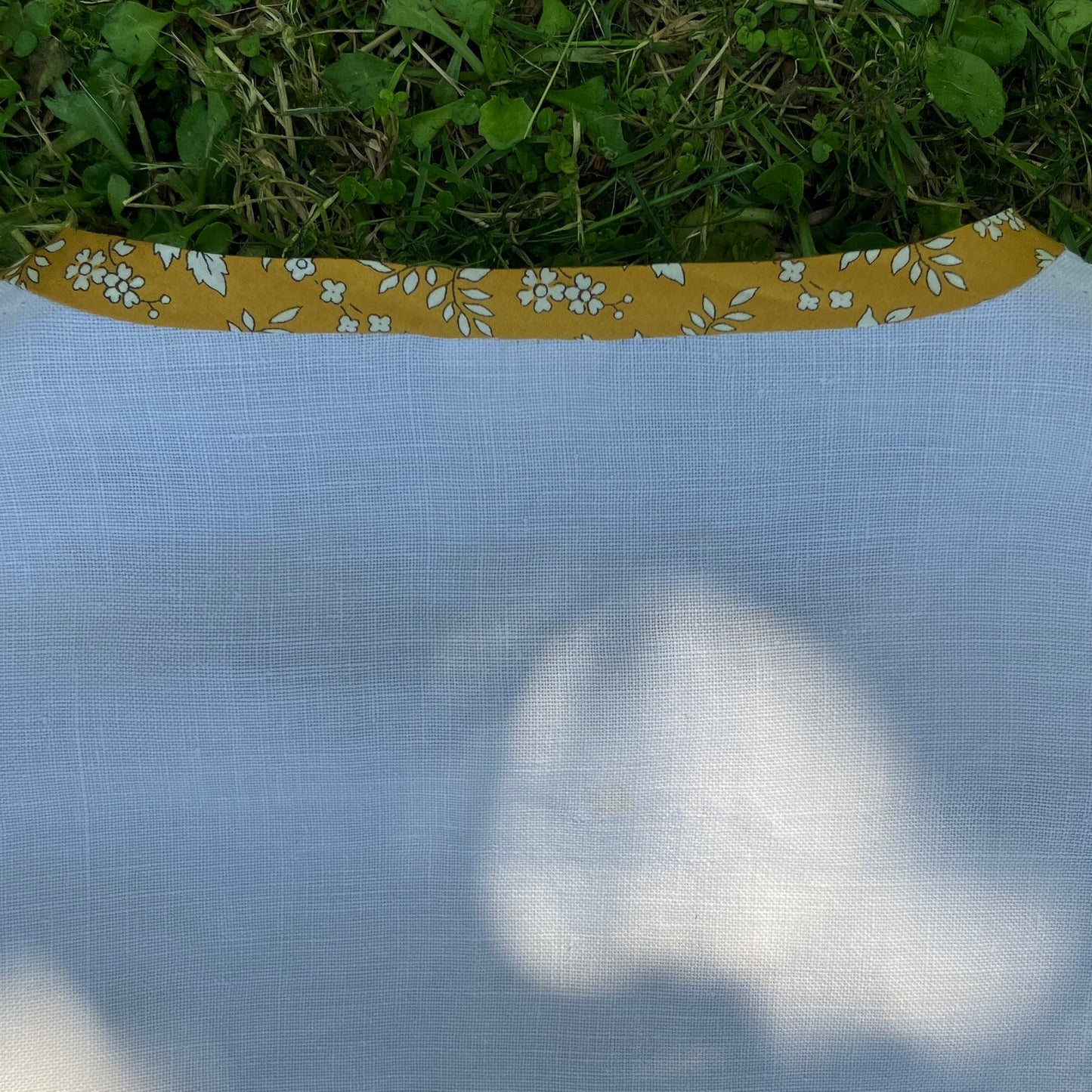 Top made from a vintage cutwork linen tablecloth