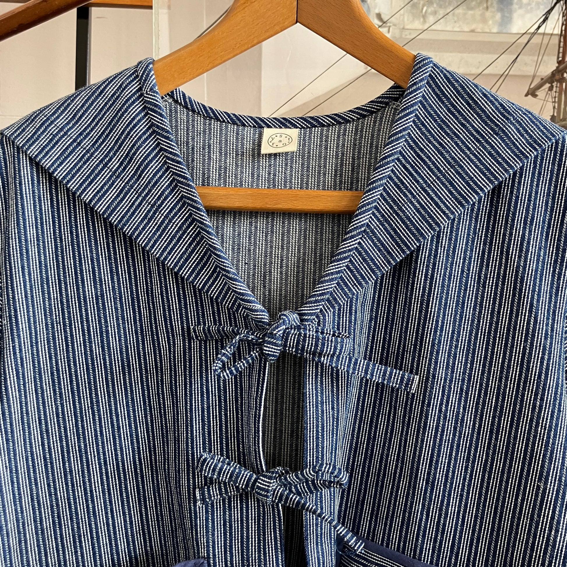 Tie-front sailor-collar shirt made from vintage deadstock striped denim