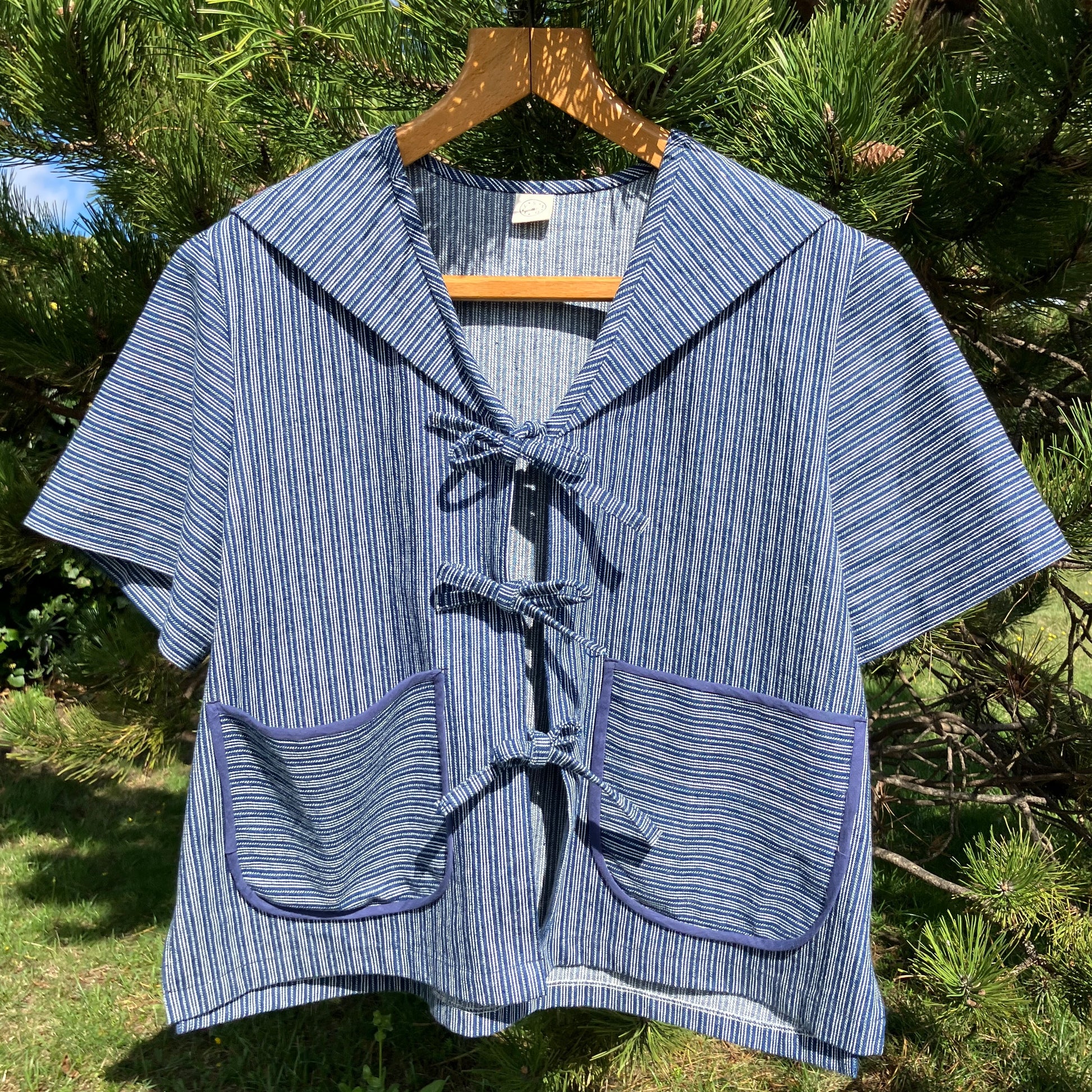 Tie-front sailor-collar shirt made from vintage deadstock striped denim