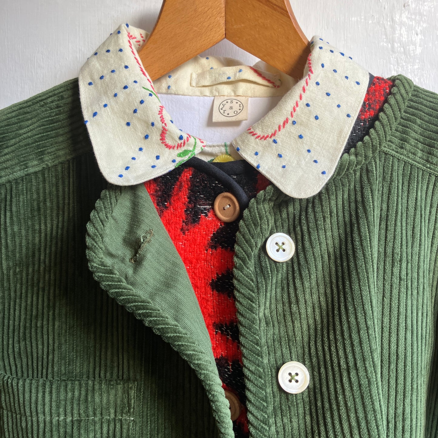 Jacket or shacket made from reclaimed green corduroy