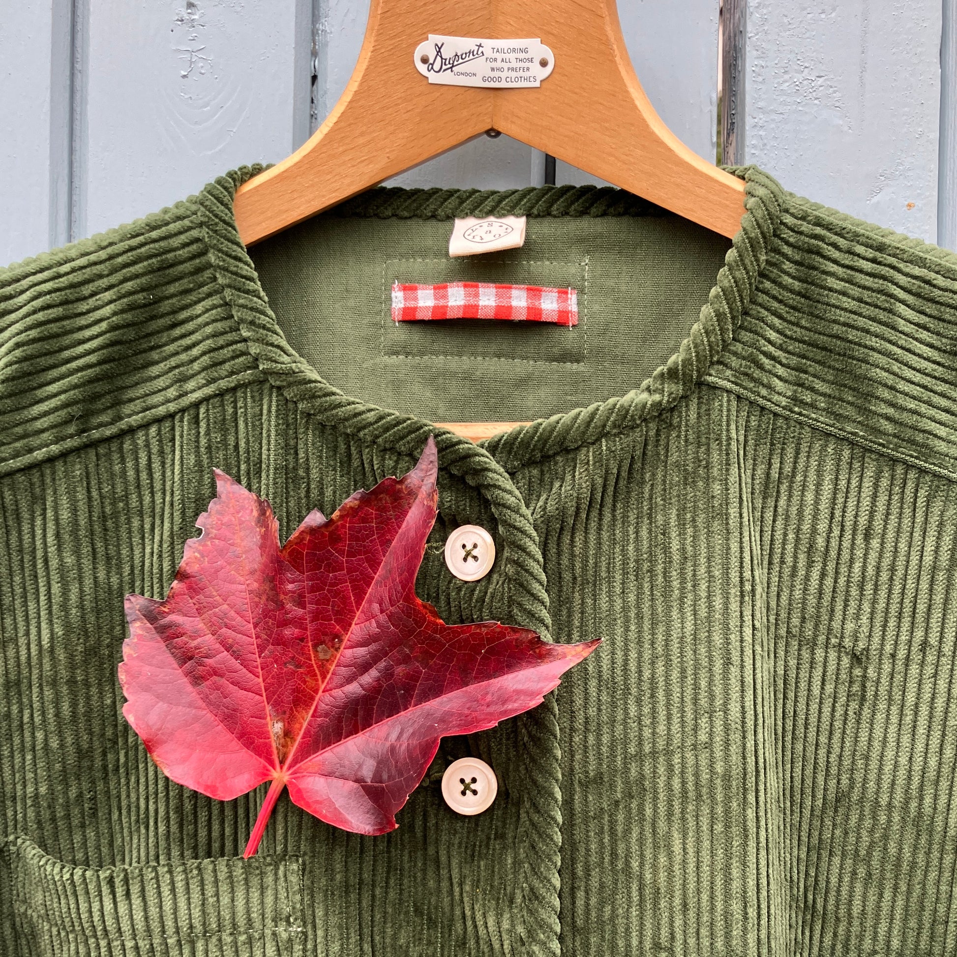 Jacket or shacket made from reclaimed green corduroy