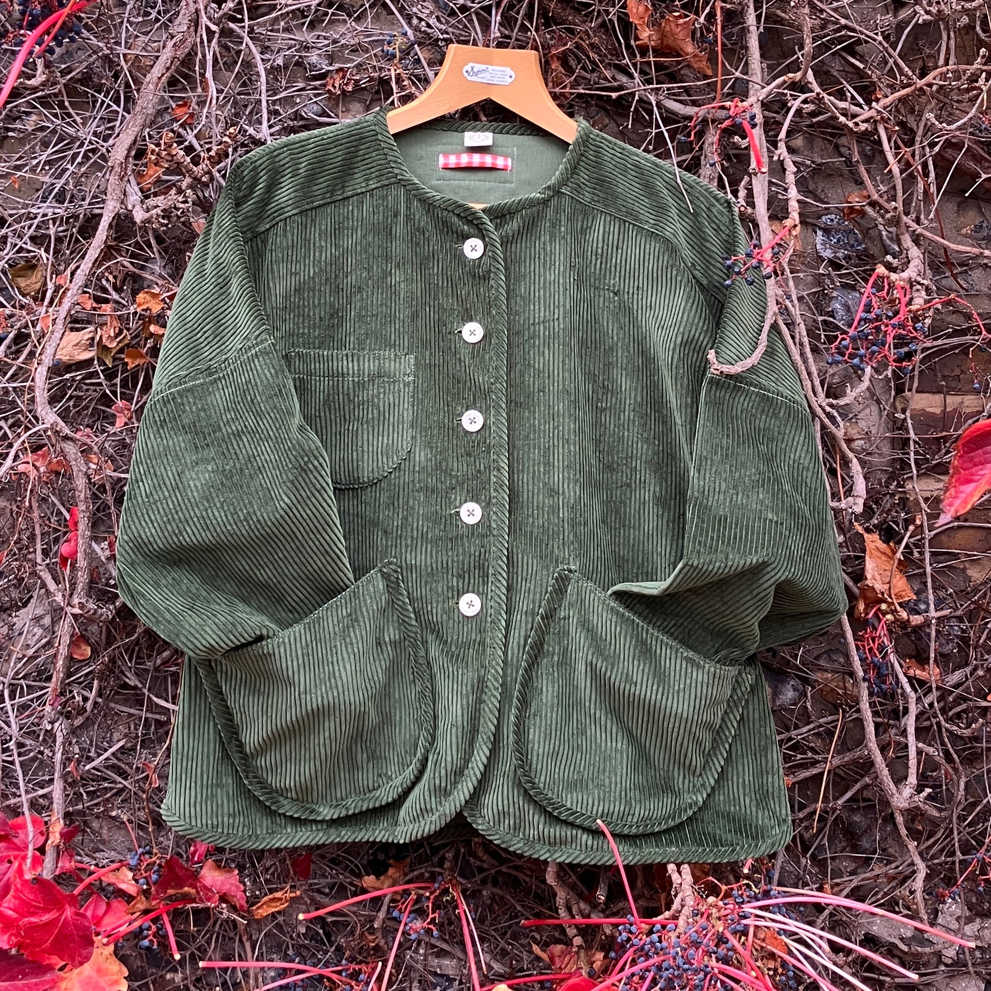 Jacket or shacket made from reclaimed green corduroy