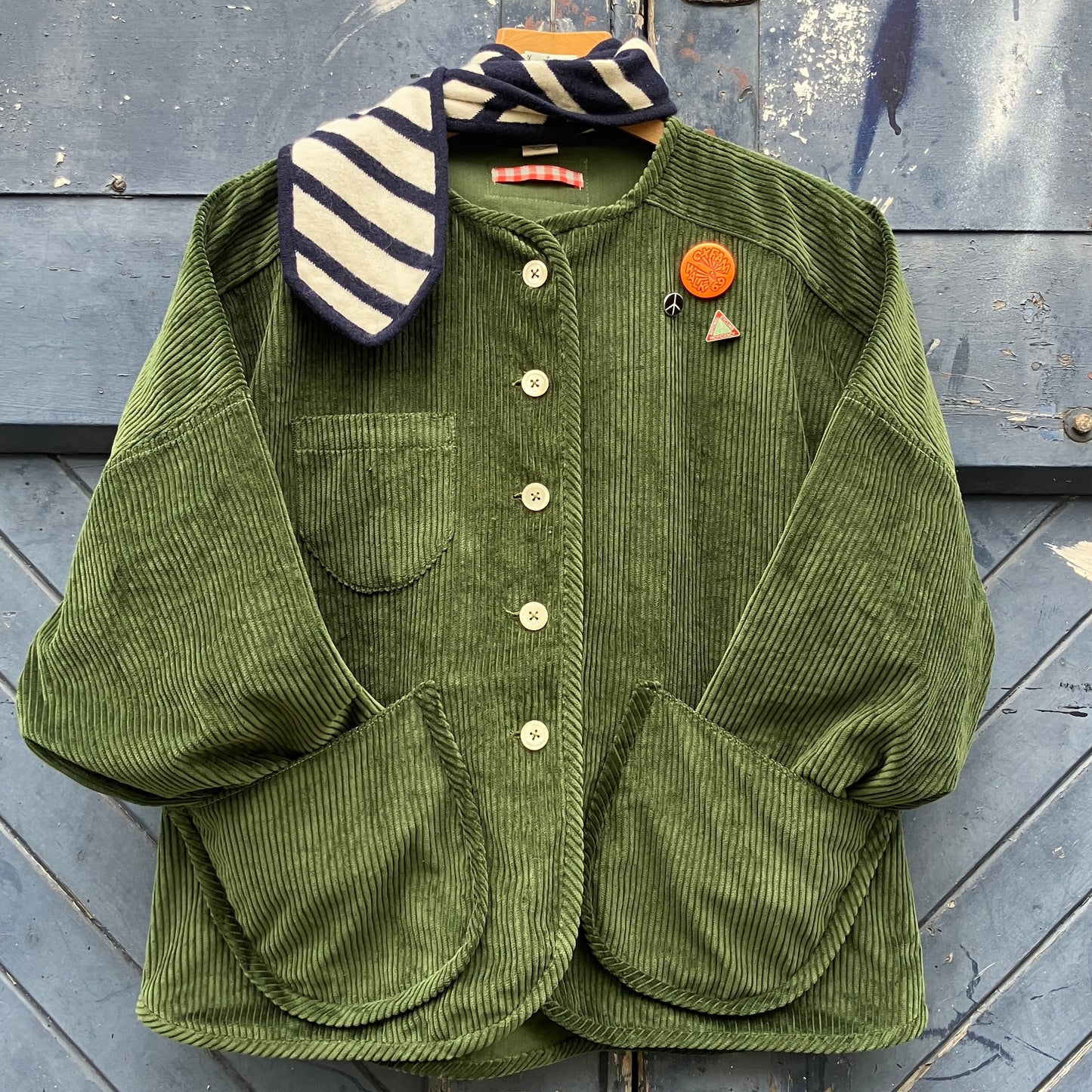 Jacket or shacket made from reclaimed green corduroy