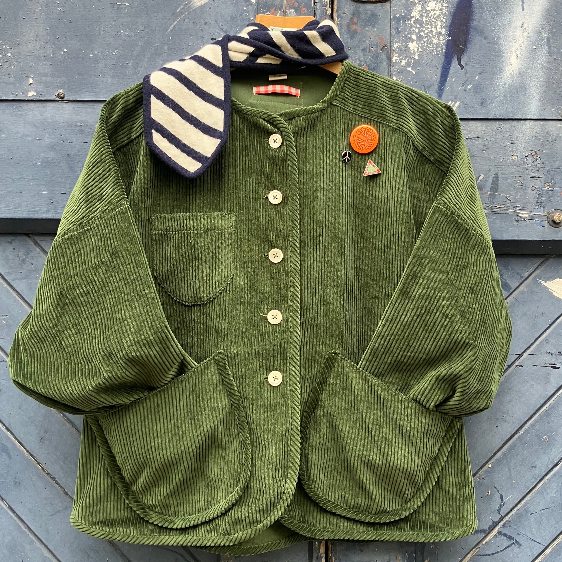 Jacket or shacket made from reclaimed green corduroy