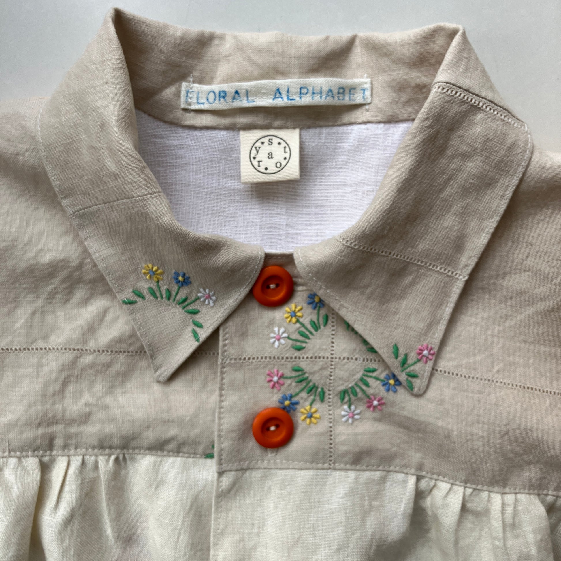 shirt made from vintage cross stitch flowers recycled linen panel