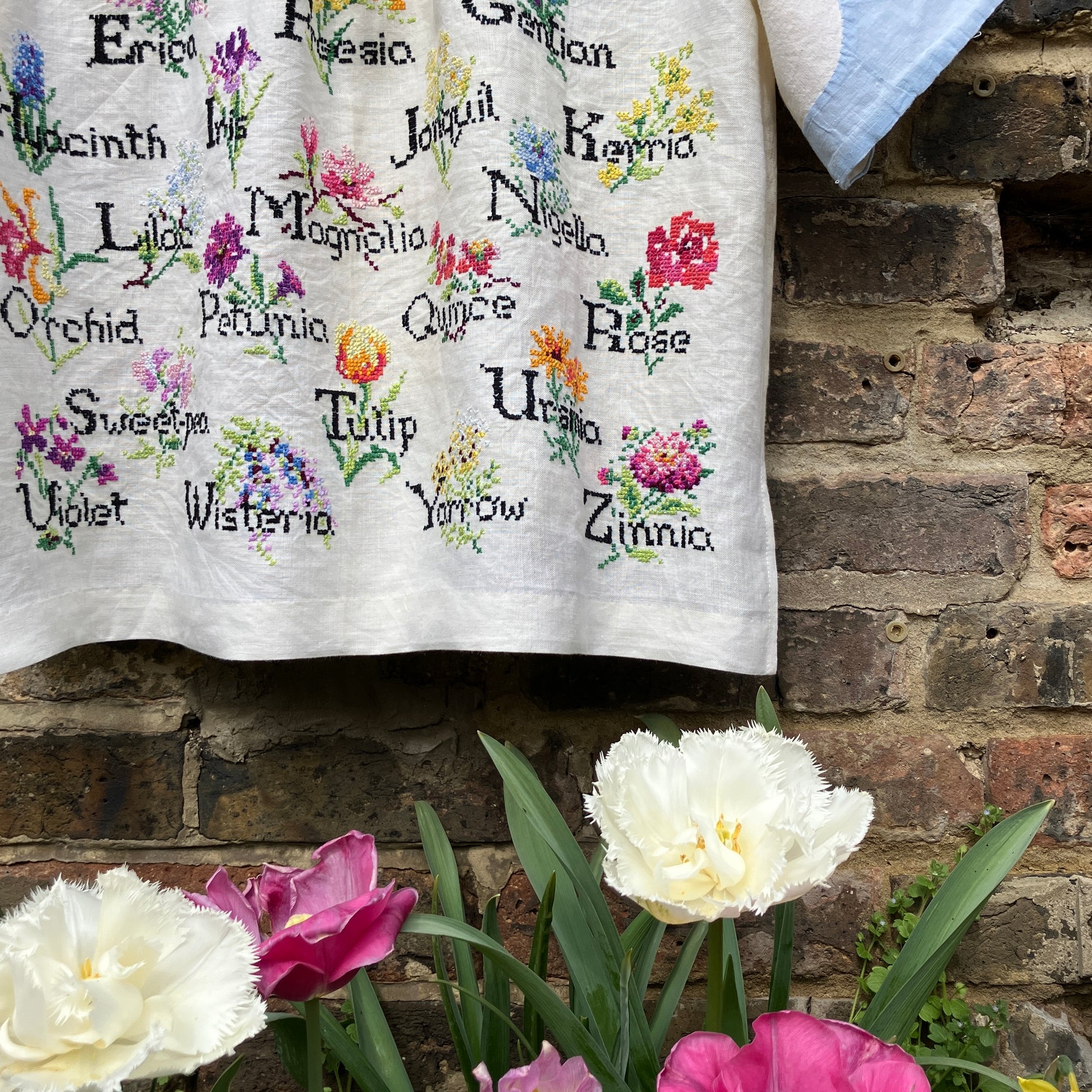 shirt made from vintage cross stitch flowers recycled linen panel