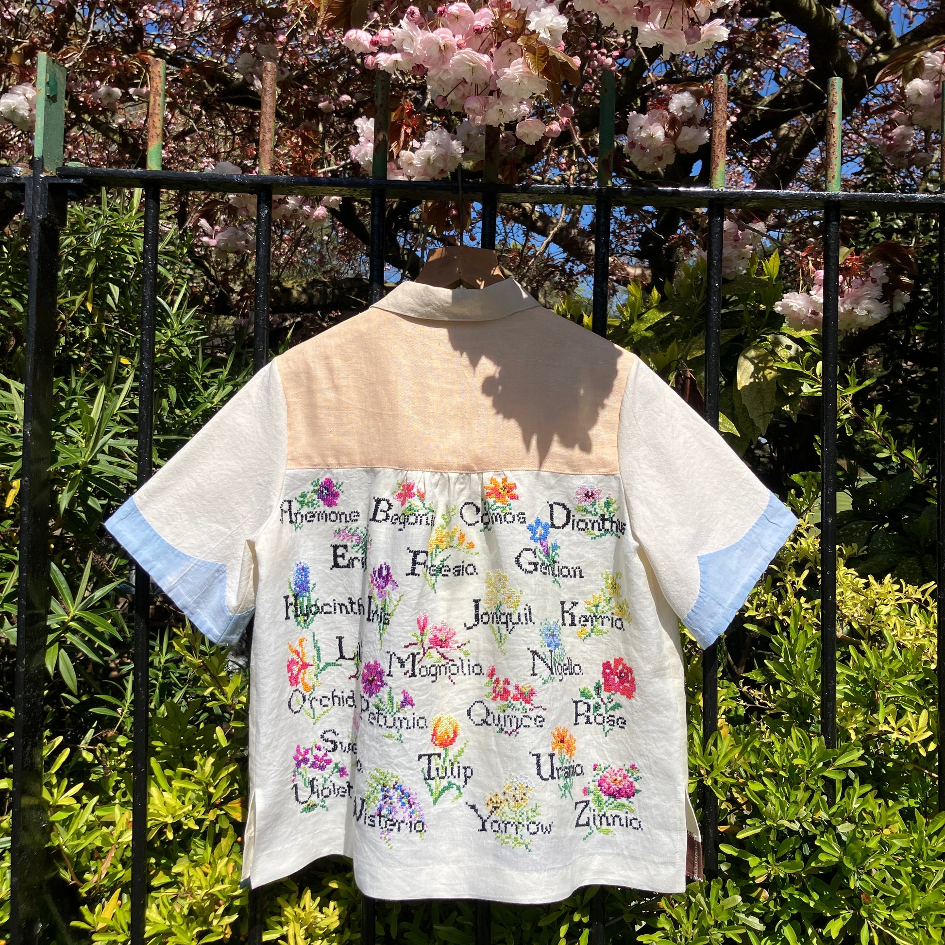shirt made from vintage cross stitch flowers recycled linen panel