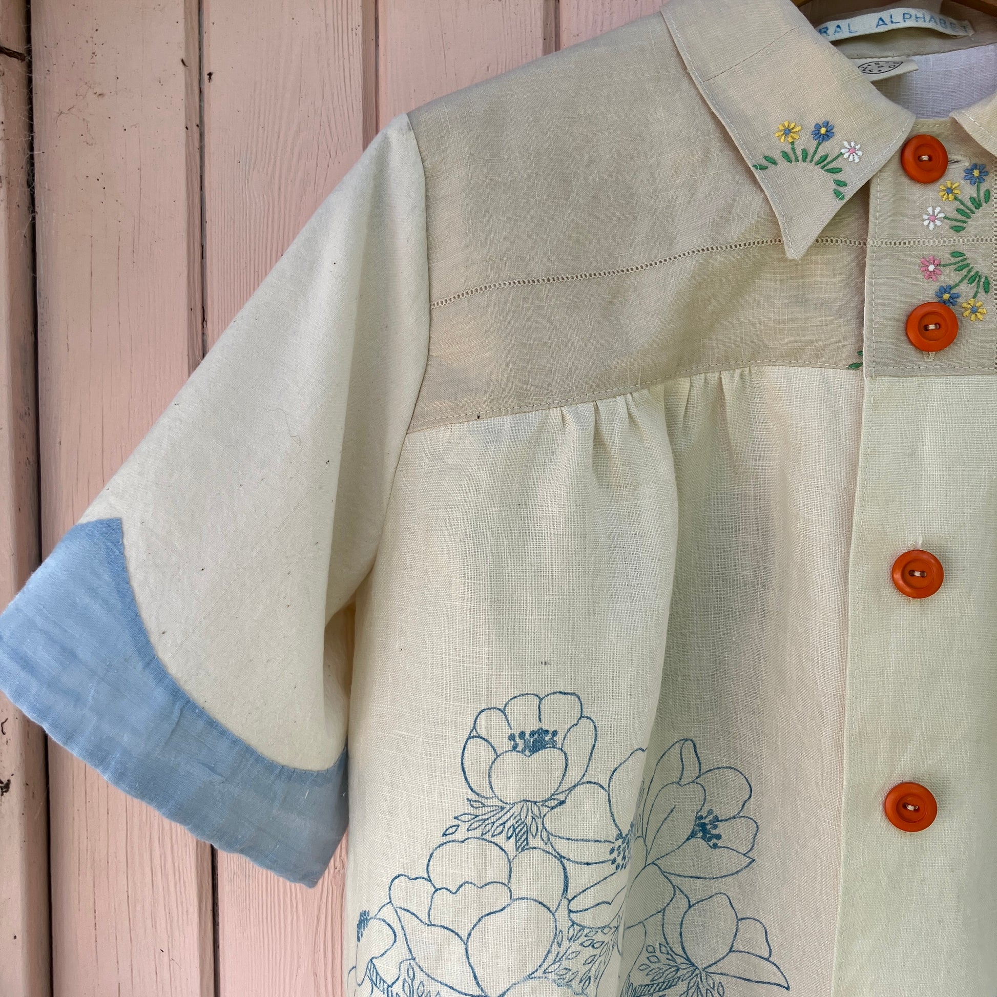 shirt made from vintage cross stitch flowers recycled linen panel