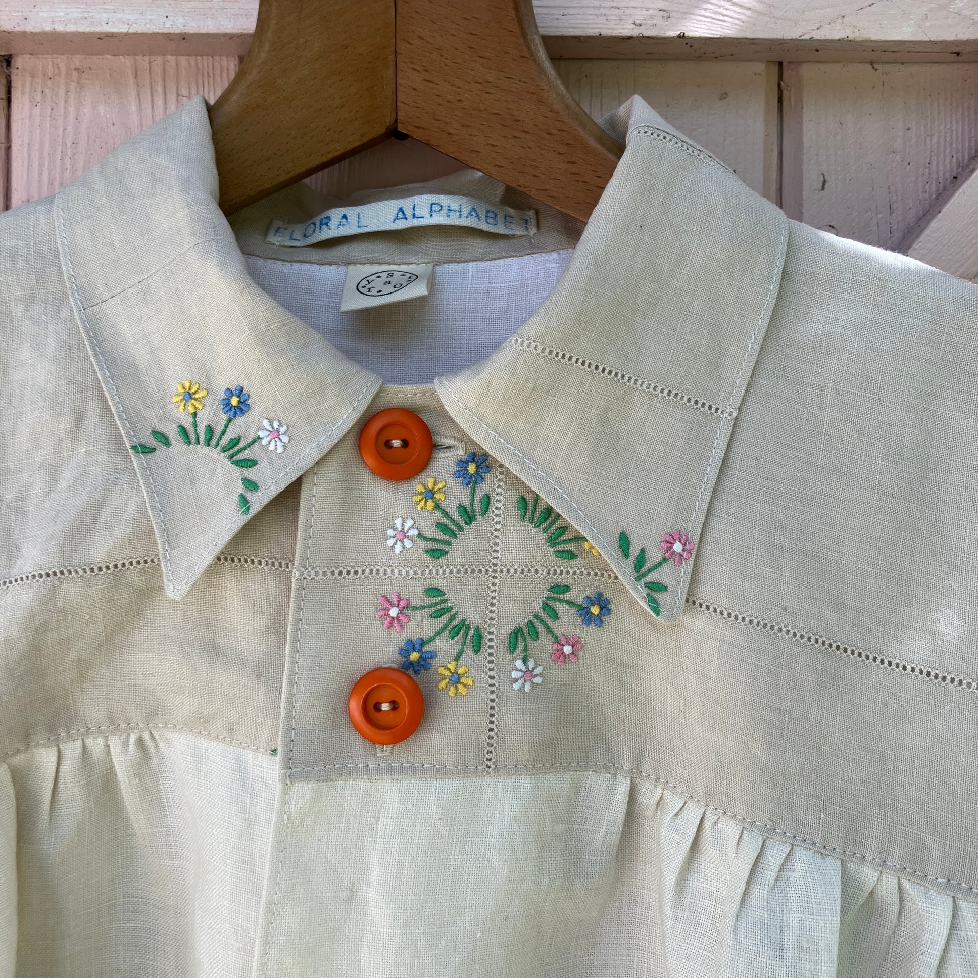 shirt made from vintage cross stitch flowers recycled linen panel