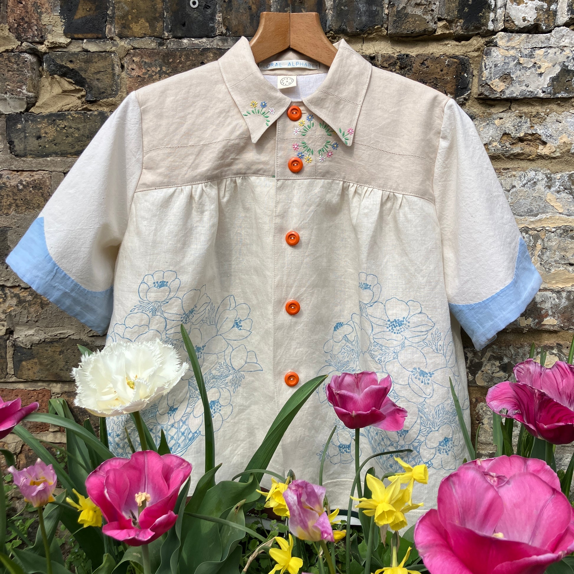 shirt made from vintage cross stitch flowers recycled linen panel