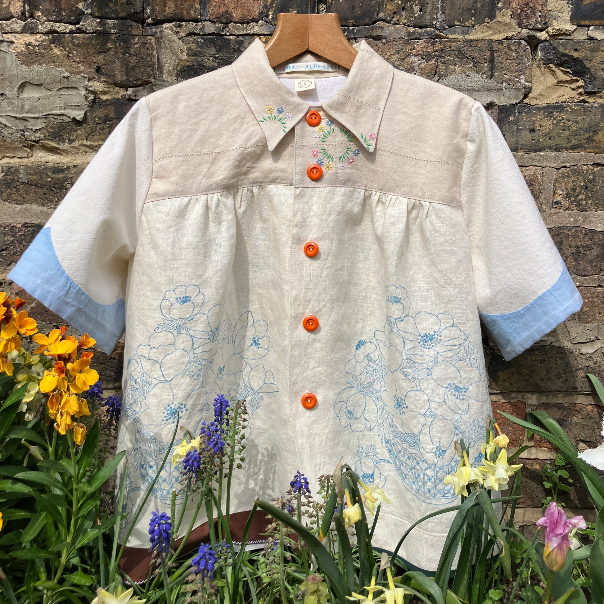 shirt made from vintage cross stitch flowers recycled linen panel