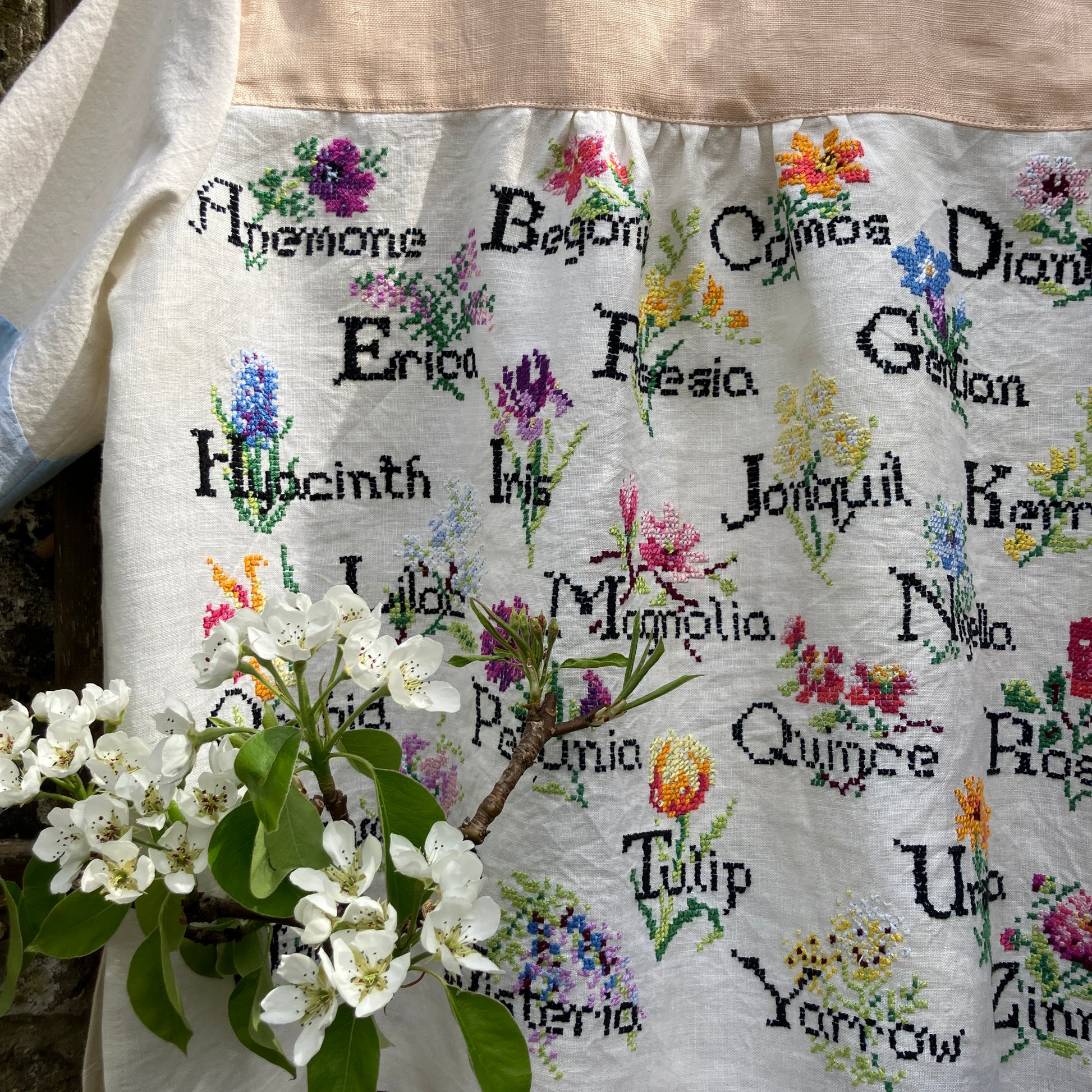 shirt made from vintage cross stitch flowers recycled linen panel