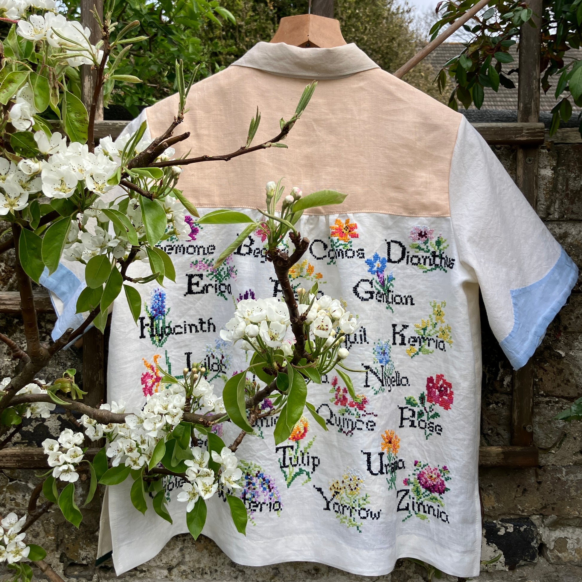 shirt made from vintage cross stitch flowers recycled linen panel