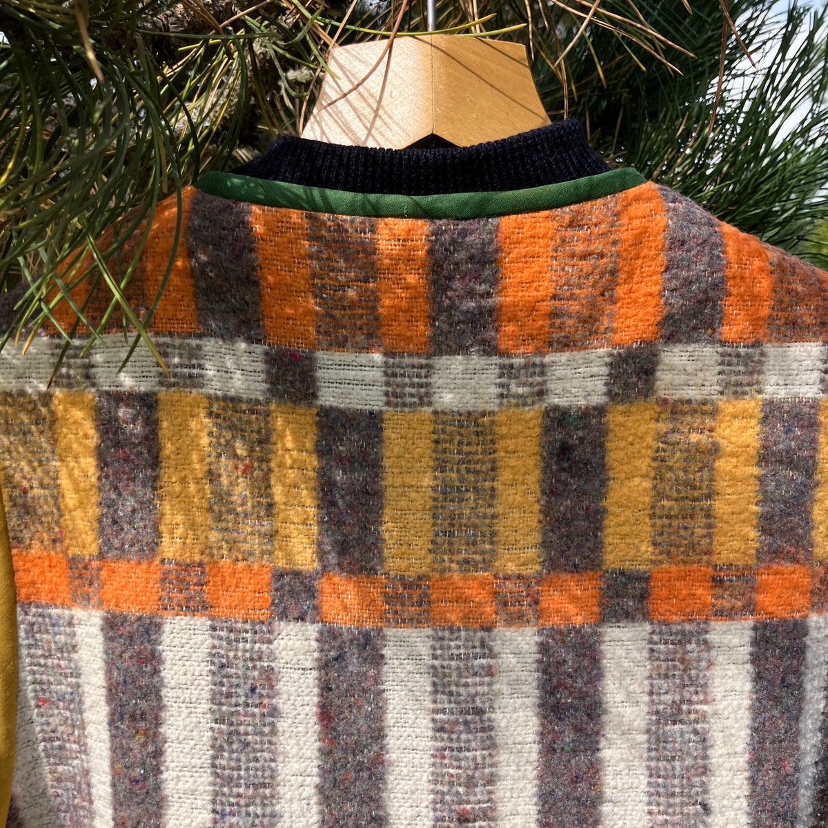 button front vest made from a geometric vintage blanket