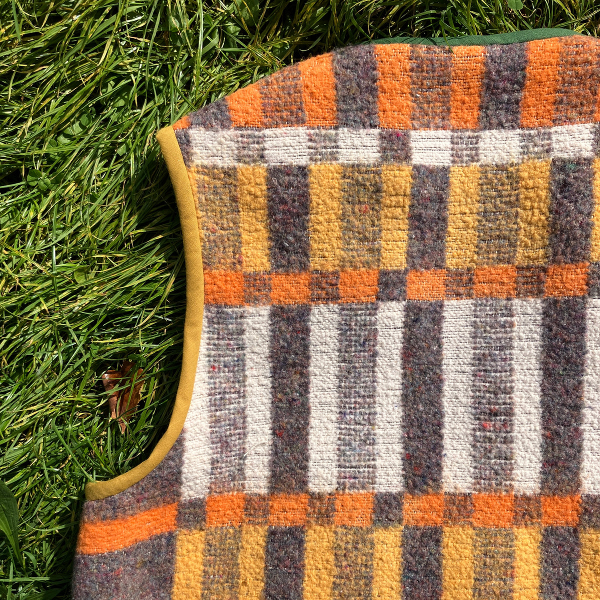 button front vest made from a geometric vintage blanket