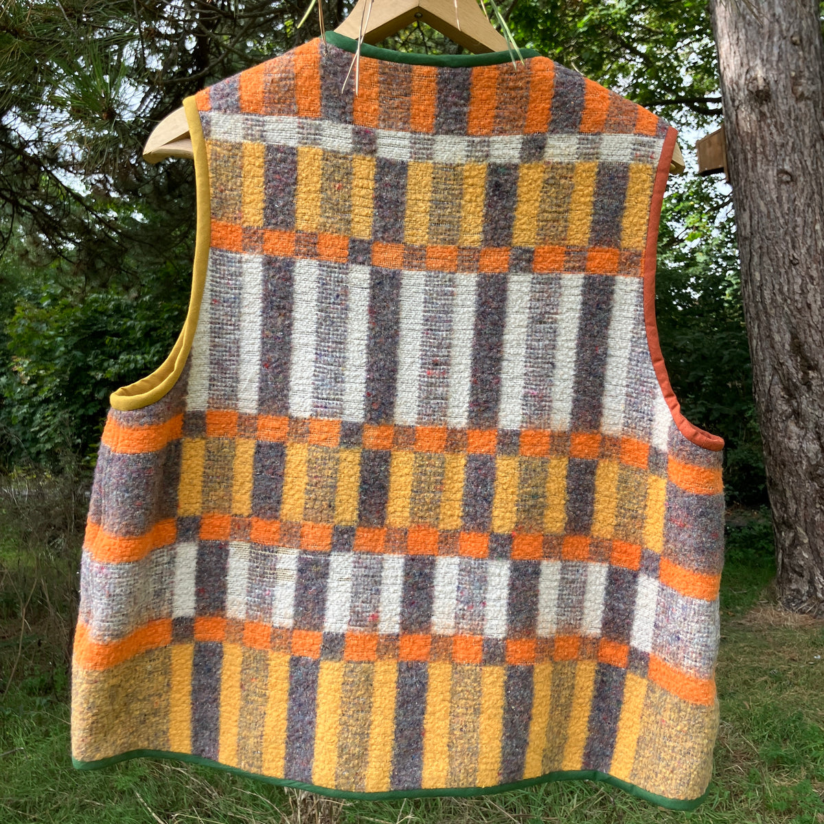 button front vest made from a geometric vintage blanket