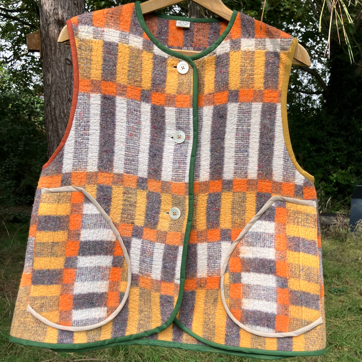 button front vest made from a geometric vintage blanket