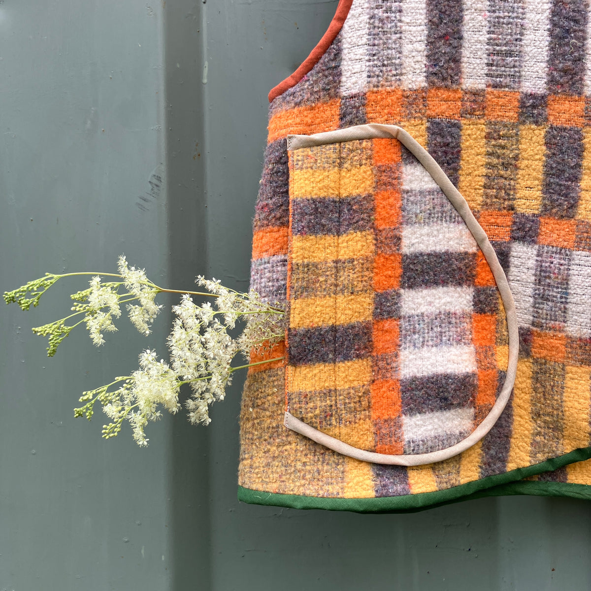 button front vest made from a geometric vintage blanket