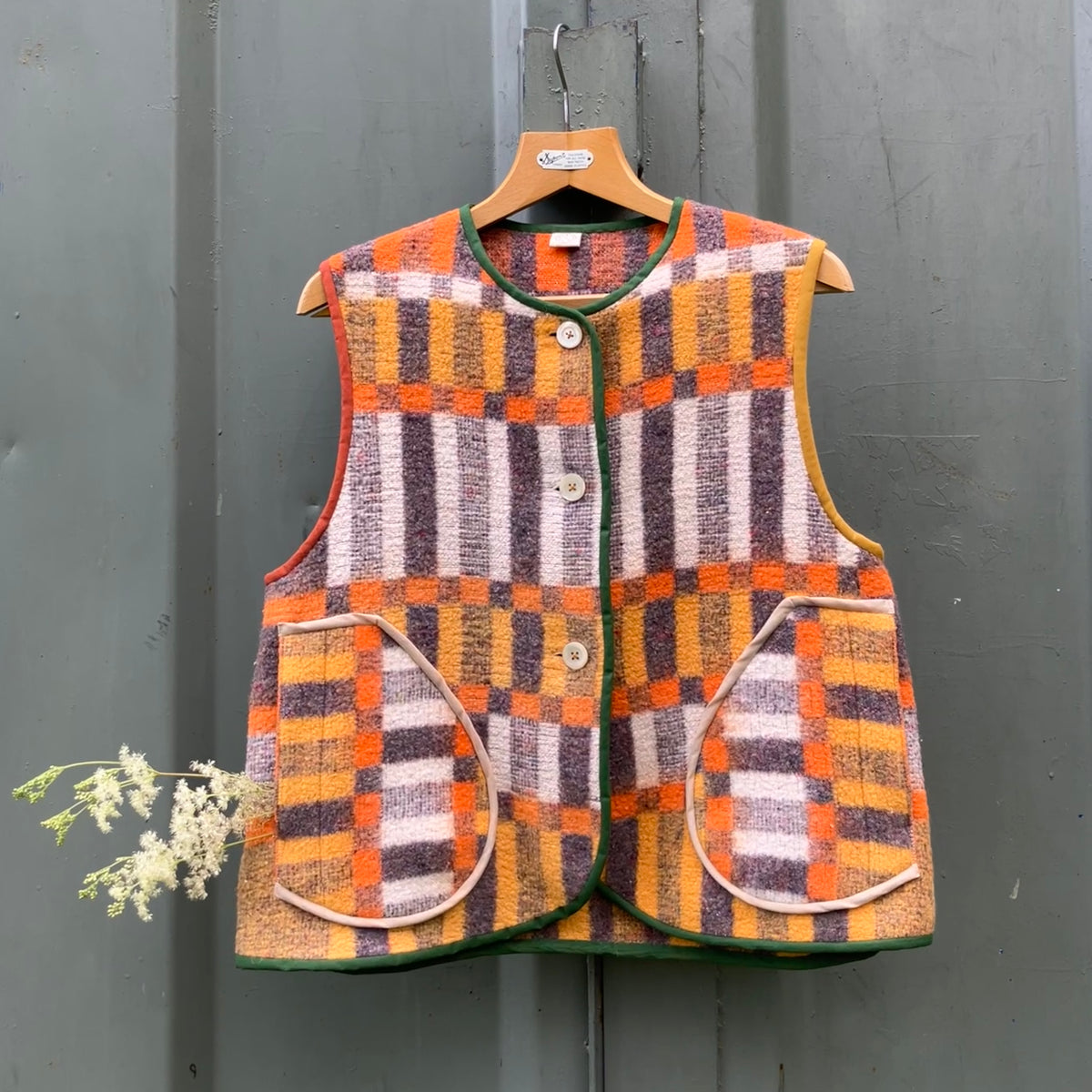 button front vest made from a geometric vintage blanket