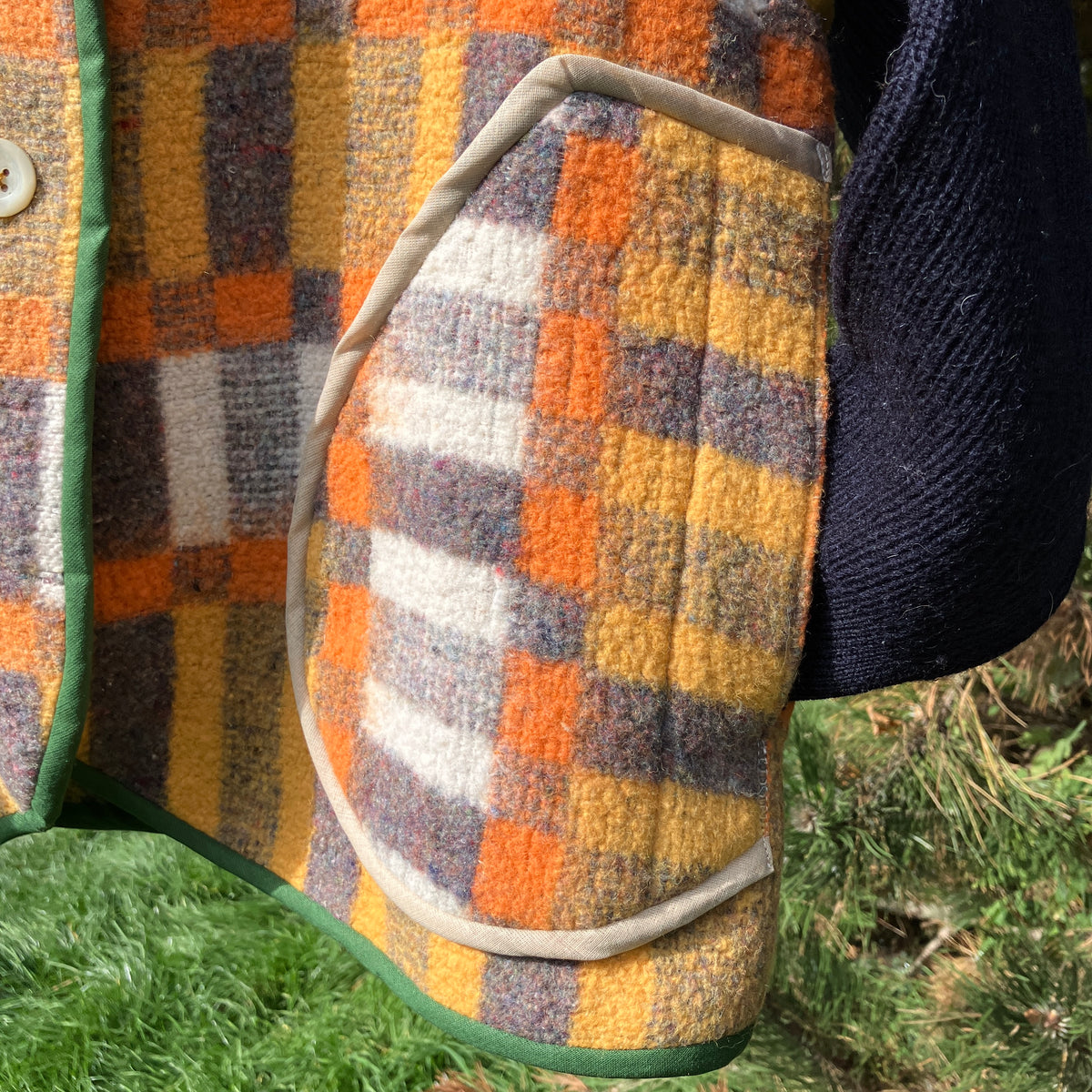 button front vest made from a geometric vintage blanket