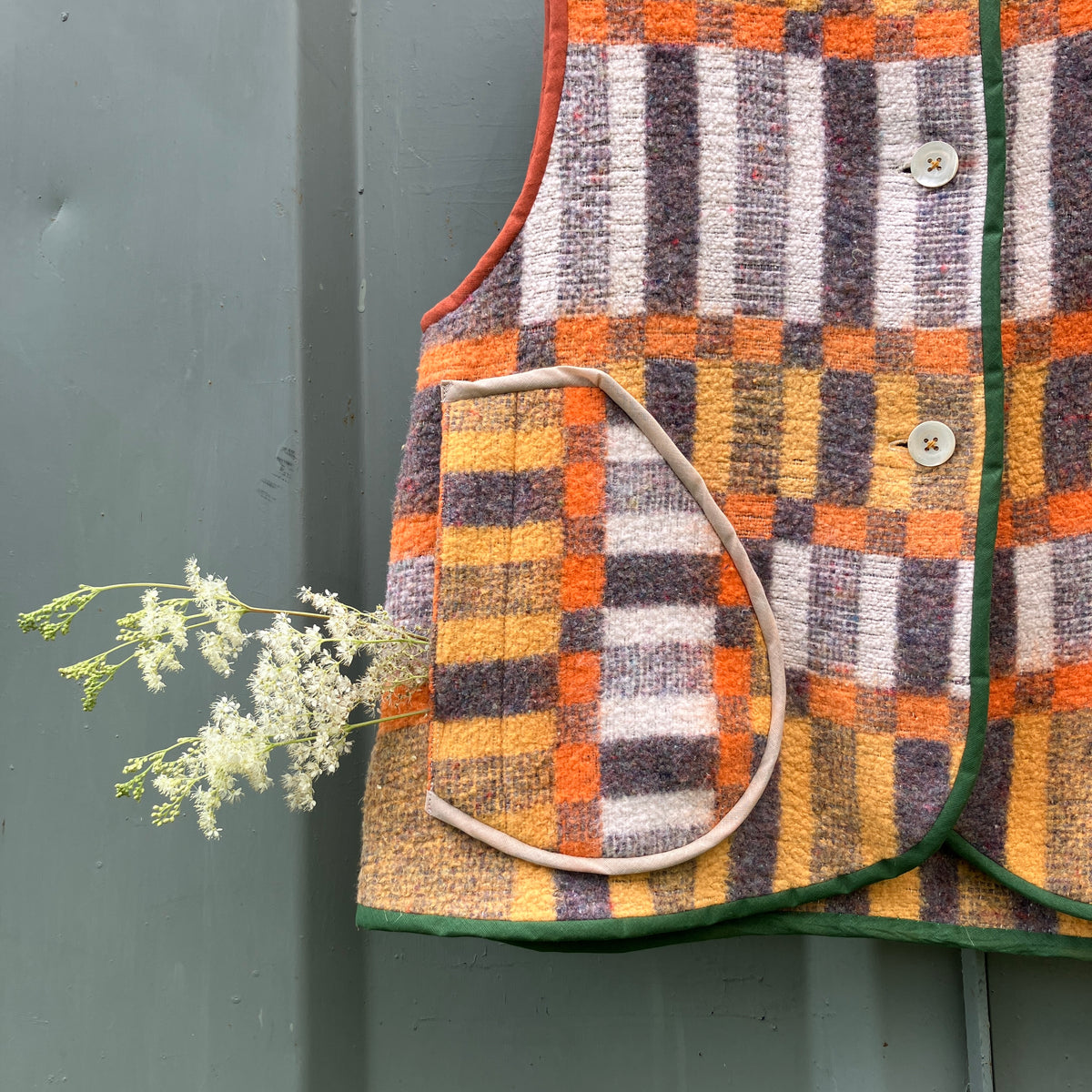 button front vest made from a geometric vintage blanket