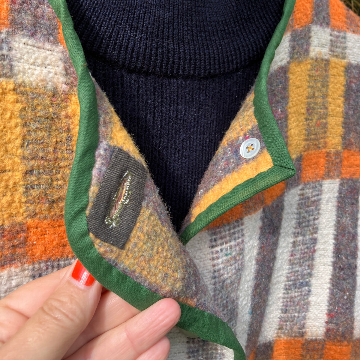 button front vest made from a geometric vintage blanket