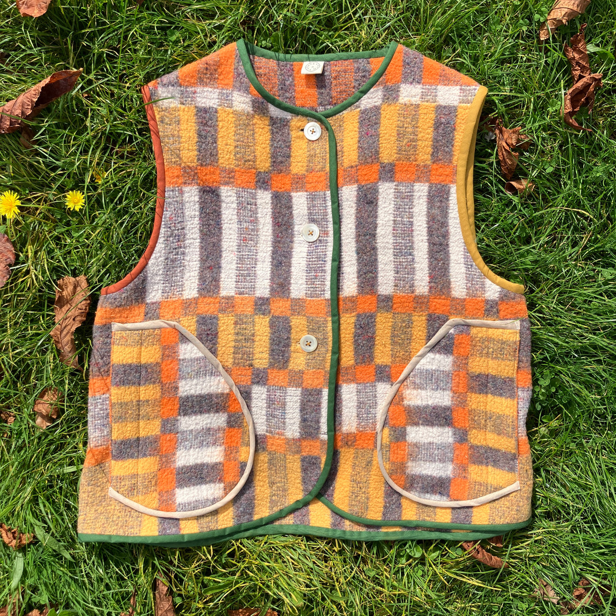 button front vest made from a geometric vintage blanket