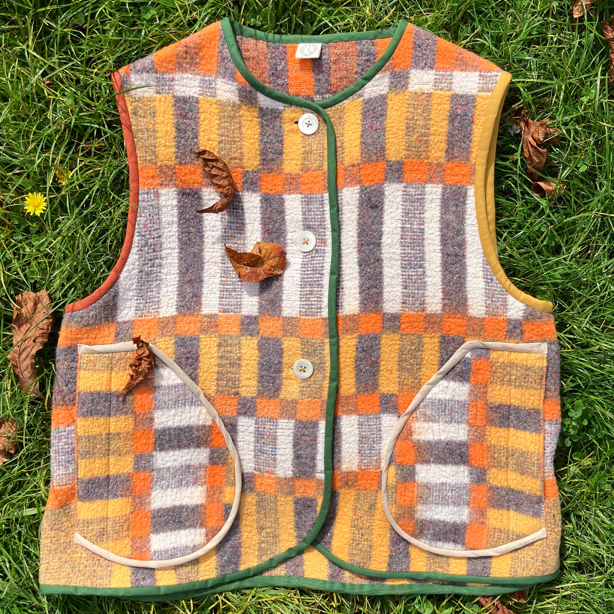 button front vest made from a geometric vintage blanket