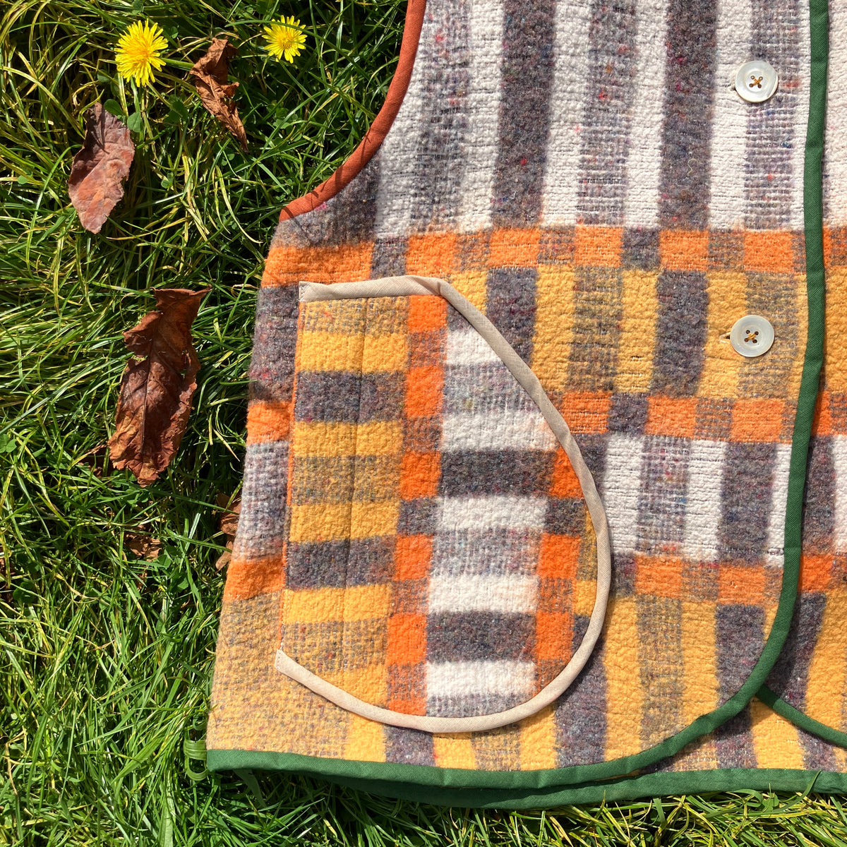 button front vest made from a geometric vintage blanket