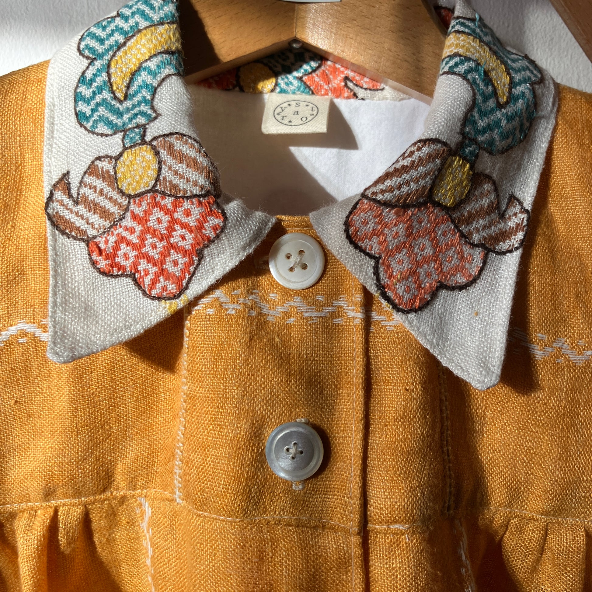 recycled linen tablecloth shirt in golden yellow with colourful embroidery
