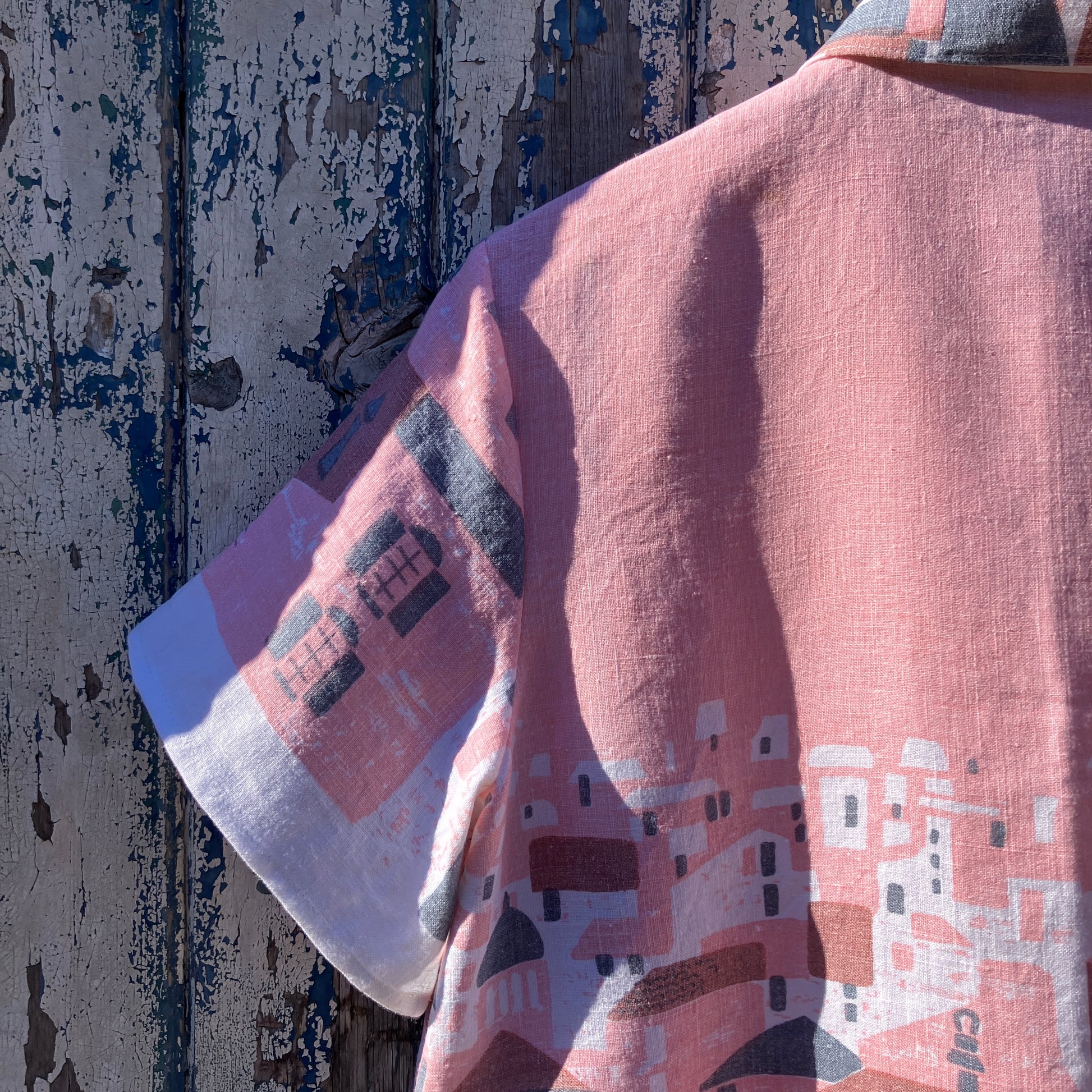 shirt made from a recycled linen tablecloth with a greek village scene