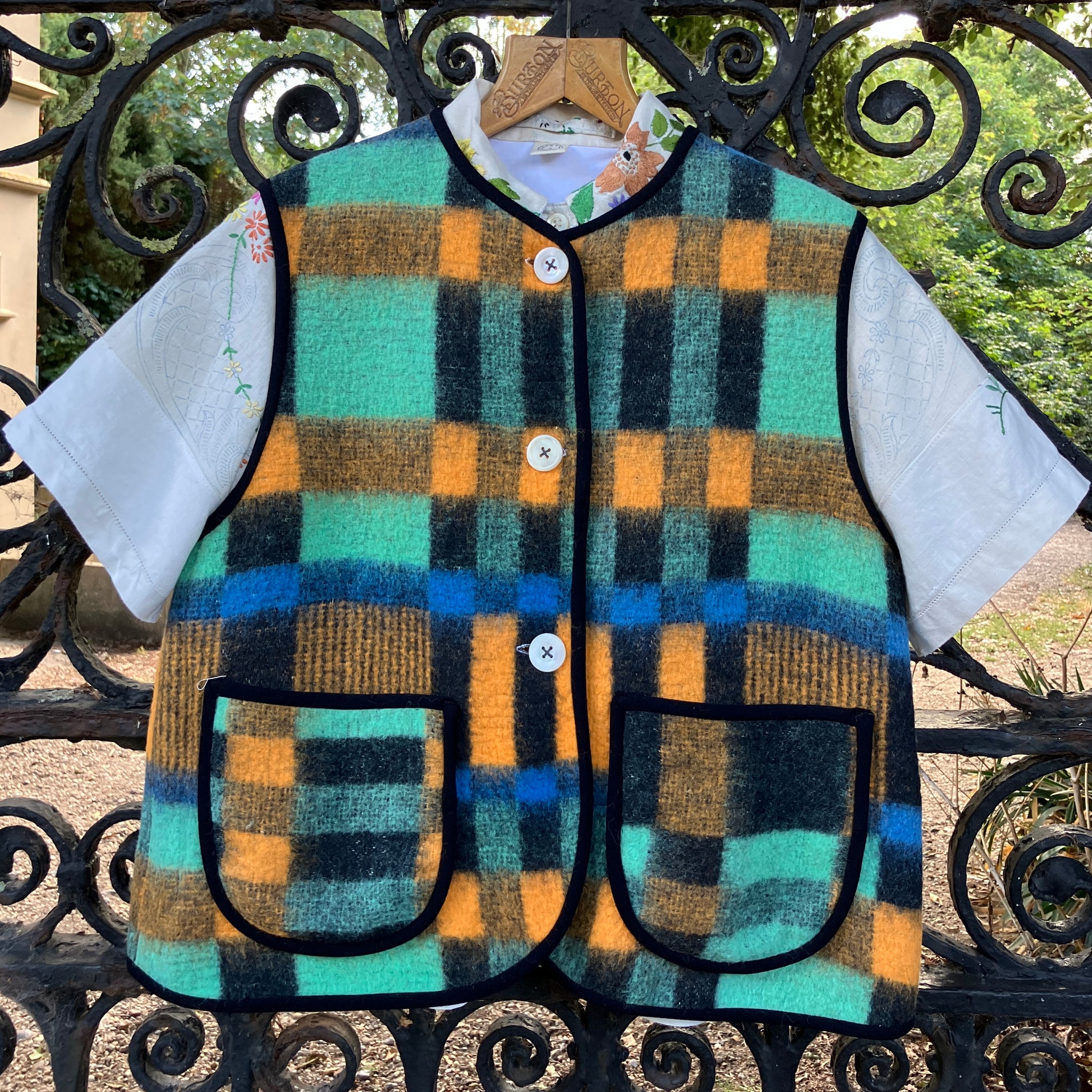 Cosy vest made from a recycled checked wool blanket
