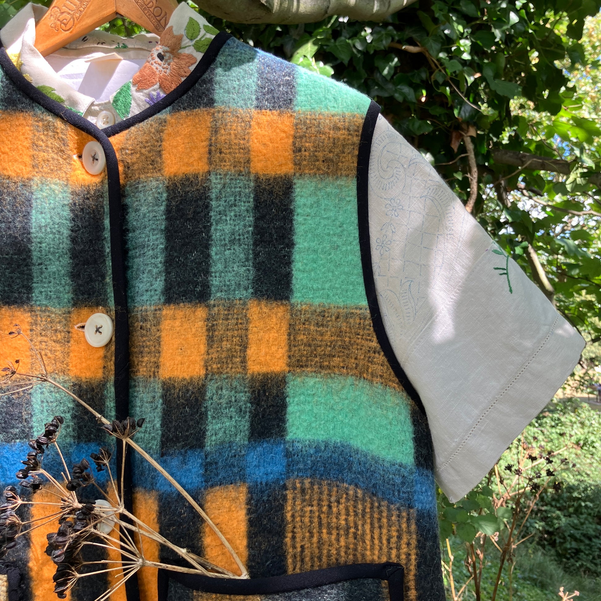 Cosy vest made from a recycled checked wool blanket