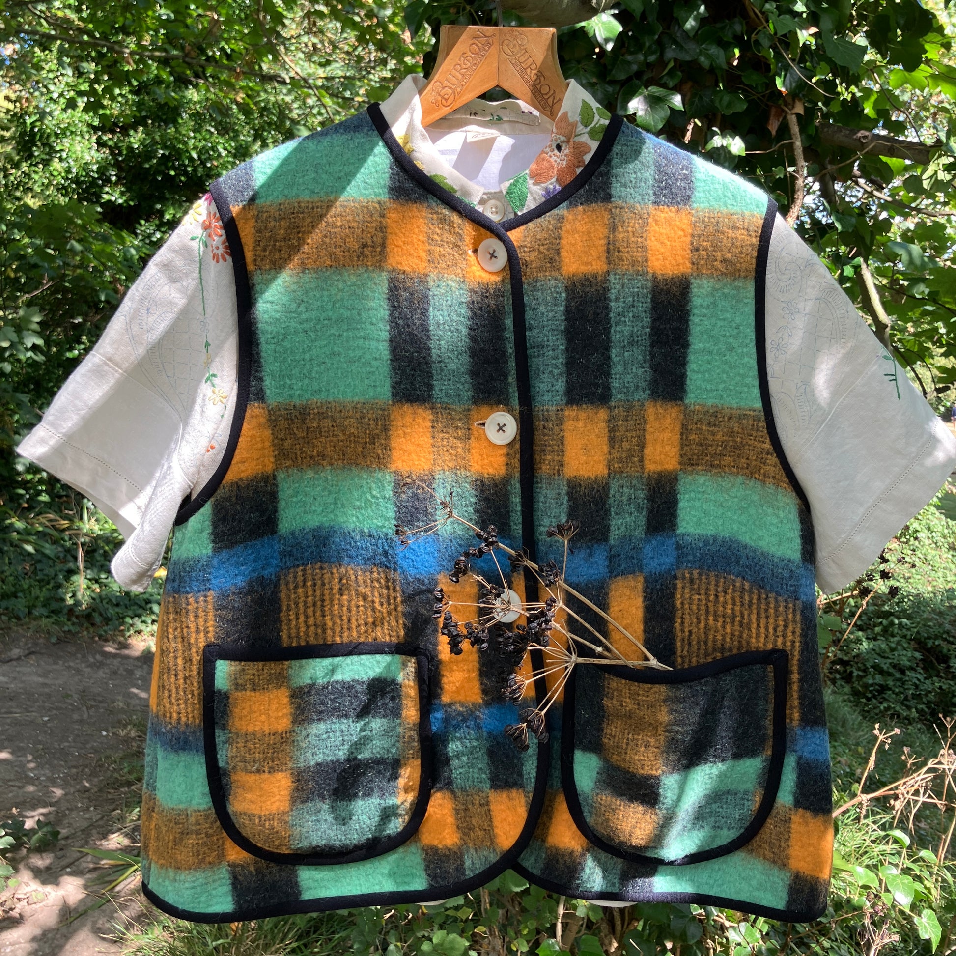 Cosy vest made from a recycled checked wool blanket