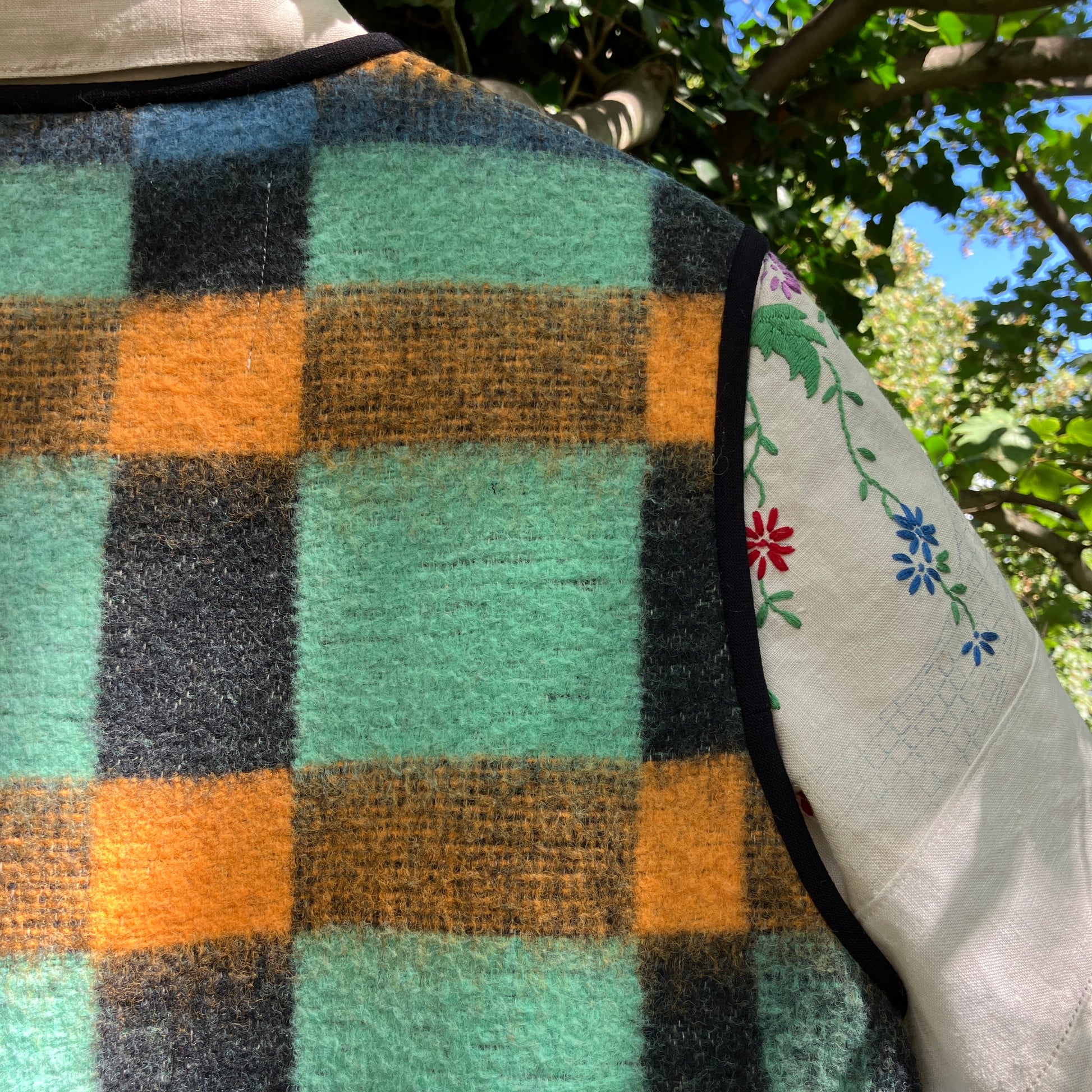 Cosy vest made from a recycled checked wool blanket