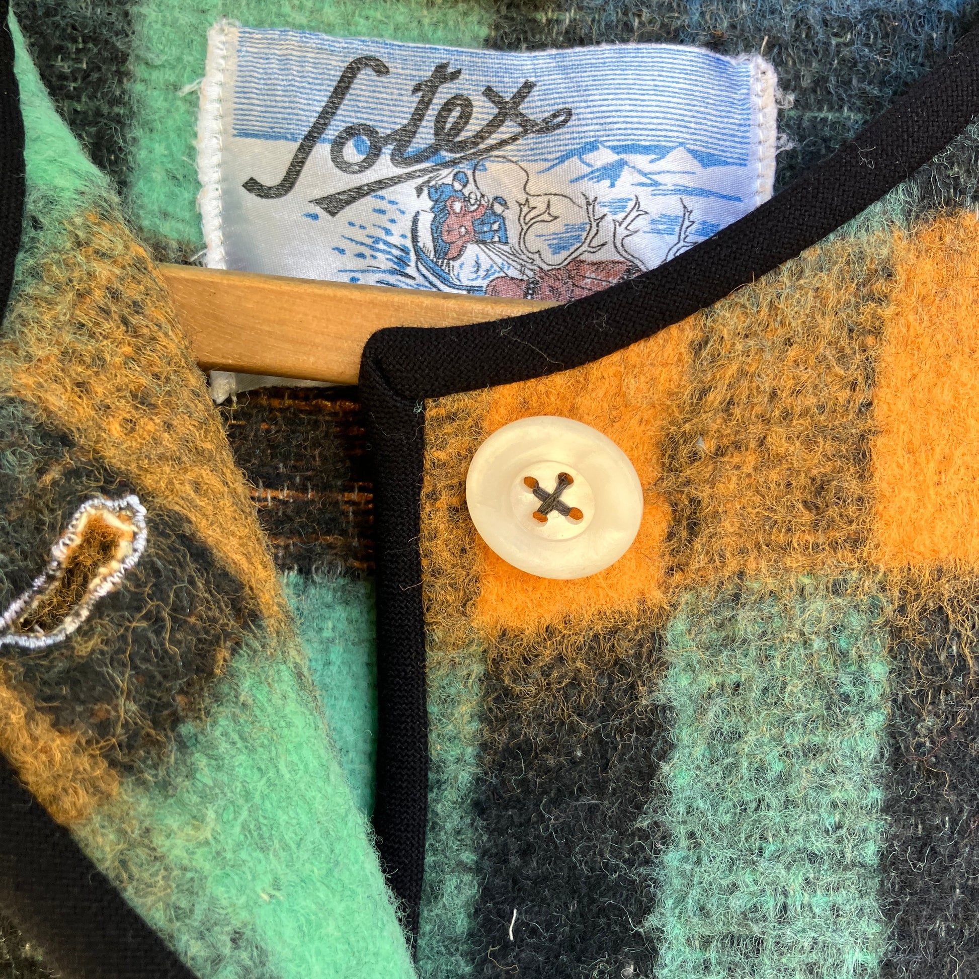 Cosy vest made from a recycled checked wool blanket