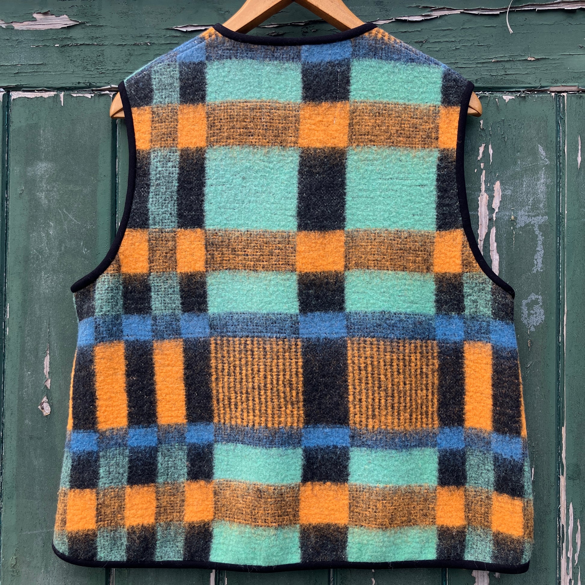 Cosy vest made from a recycled checked wool blanket