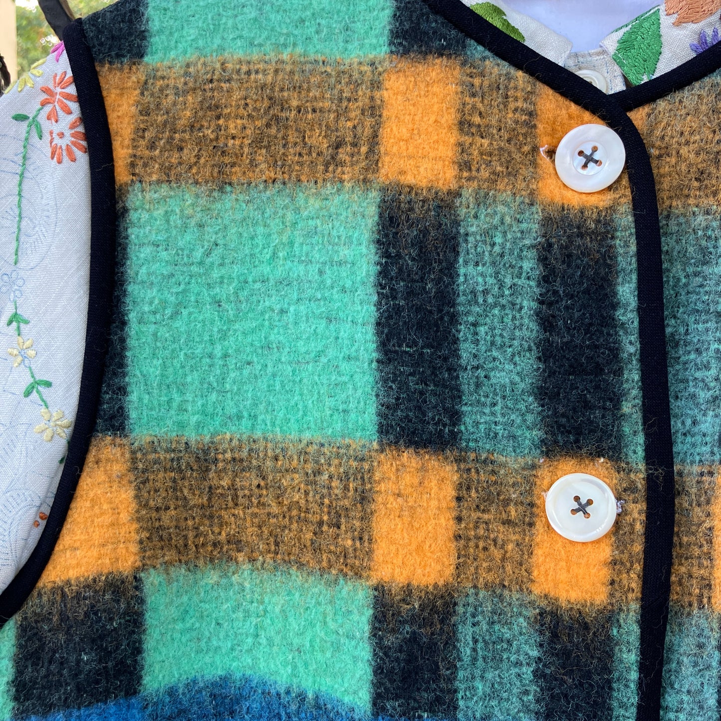 Cosy vest made from a recycled checked wool blanket