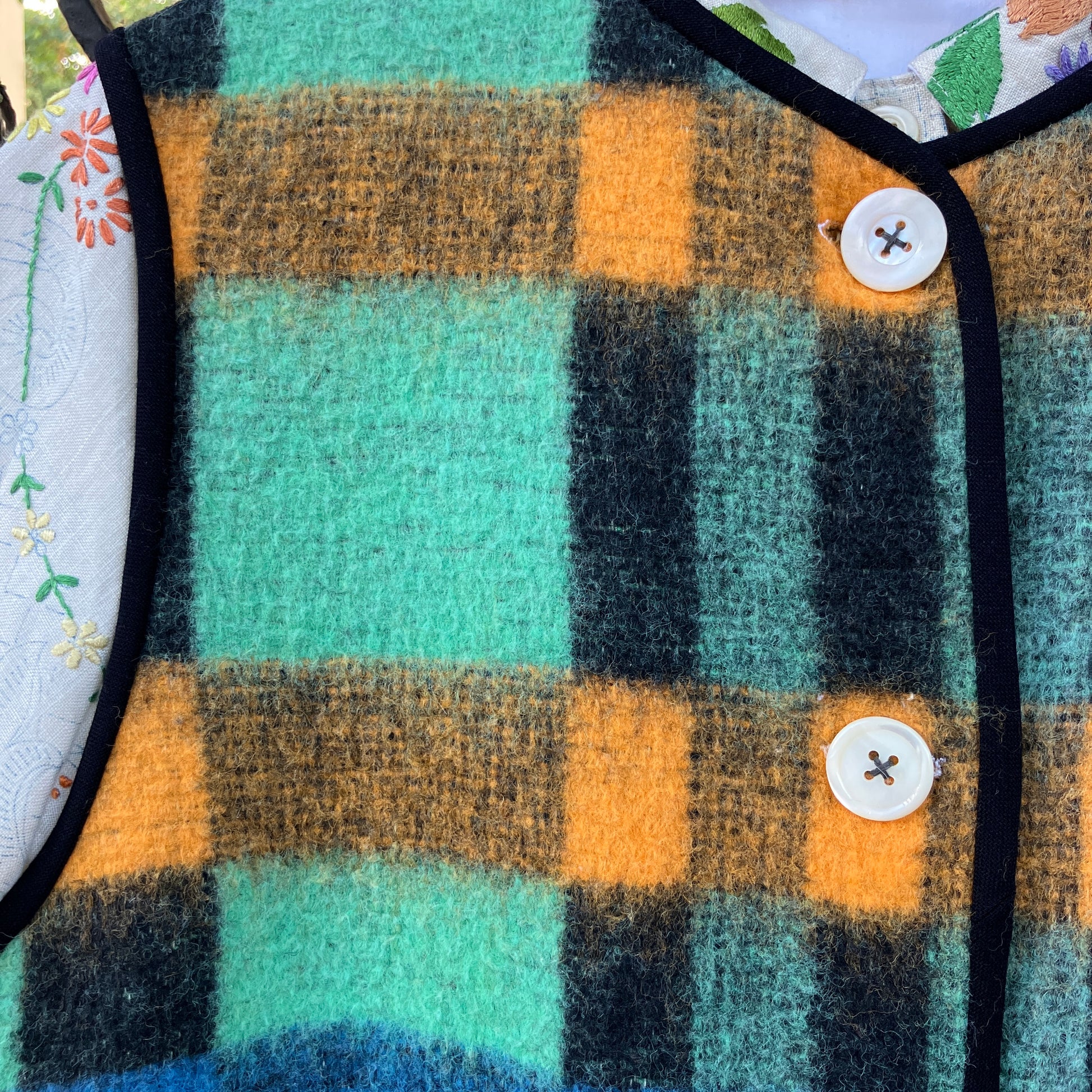 Cosy vest made from a recycled checked wool blanket