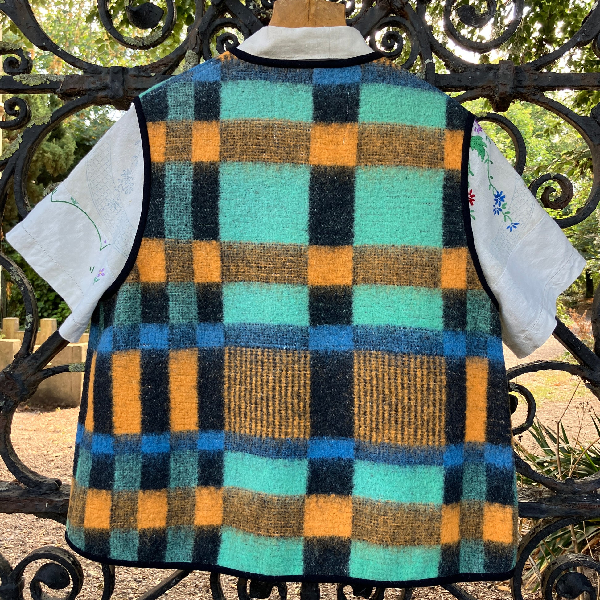 Cosy vest made from a recycled checked wool blanket