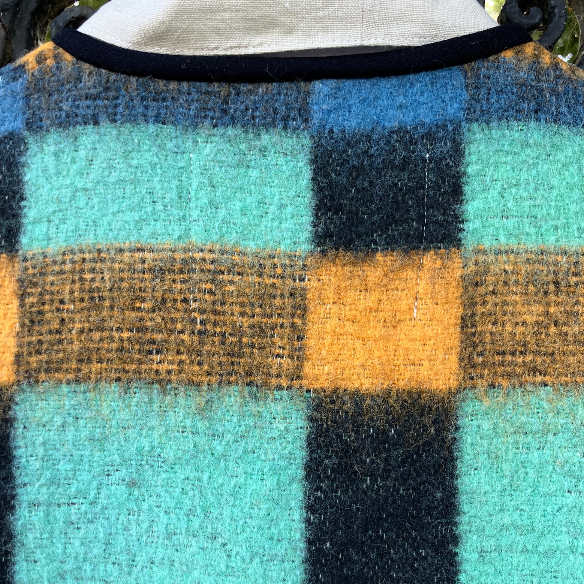 Cosy vest made from a recycled checked wool blanket