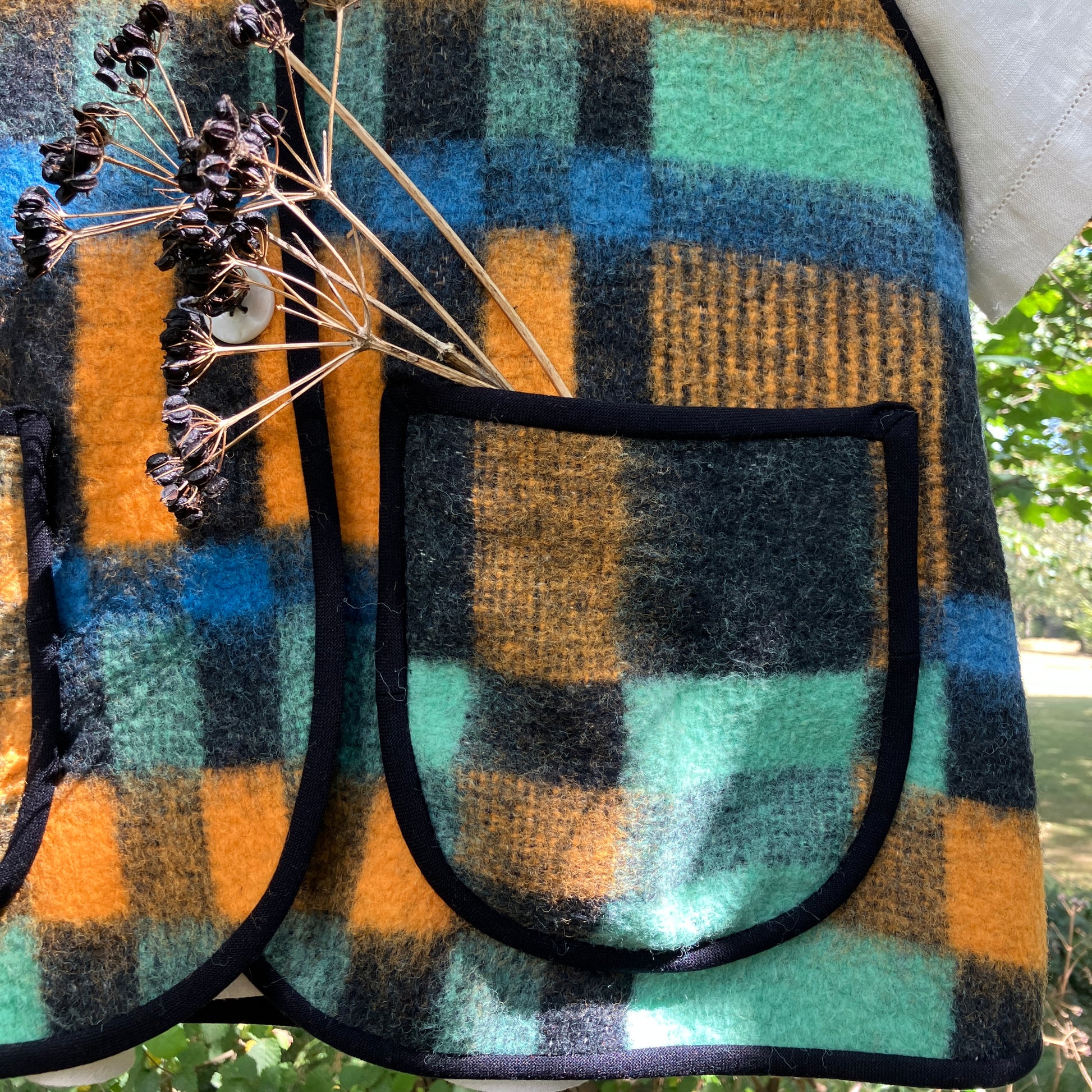 Cosy vest made from a recycled checked wool blanket
