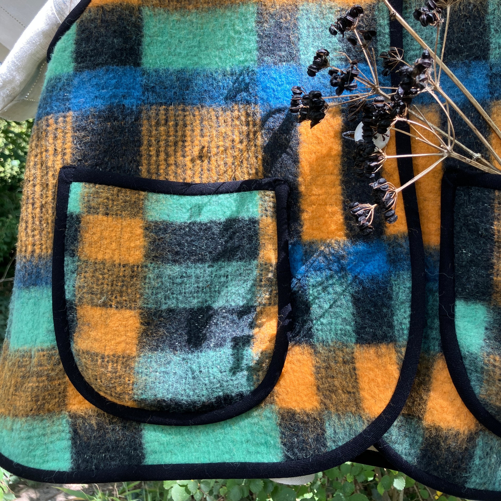 Cosy vest made from a recycled checked wool blanket